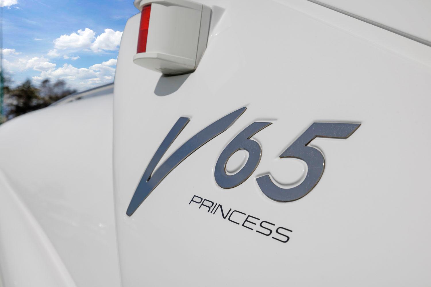 Princess-65 2003-DISMISSED CA-US-Close-up of 2003 Princess V65 yacht logo against blue sky.-8801006 | Thumbnail