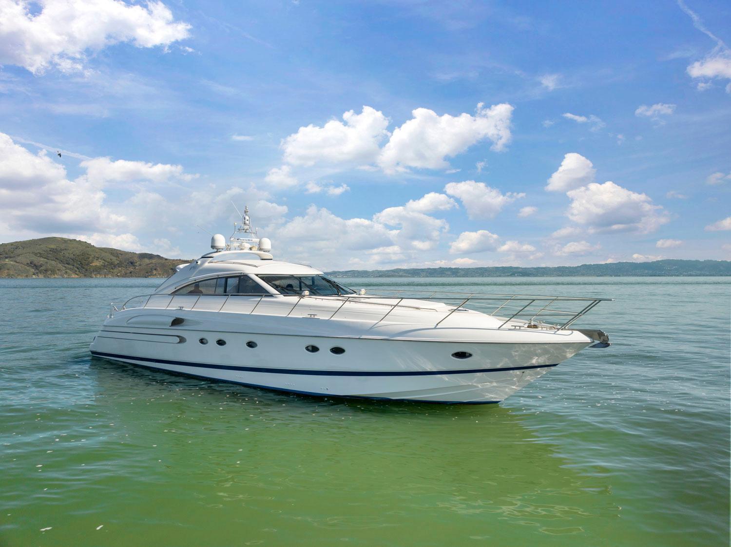 Princess-65 2003-DISMISSED CA-US-Luxury 2003 Princess 65 yacht cruising on serene waters under a clear blue sky.-8801006