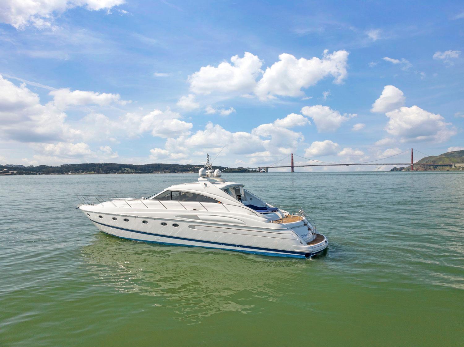 Princess-65 2003-DISMISSED CA-US-Luxury 2003 Princess 65 yacht cruising near iconic bridge under blue sky.-8801006 | Thumbnail