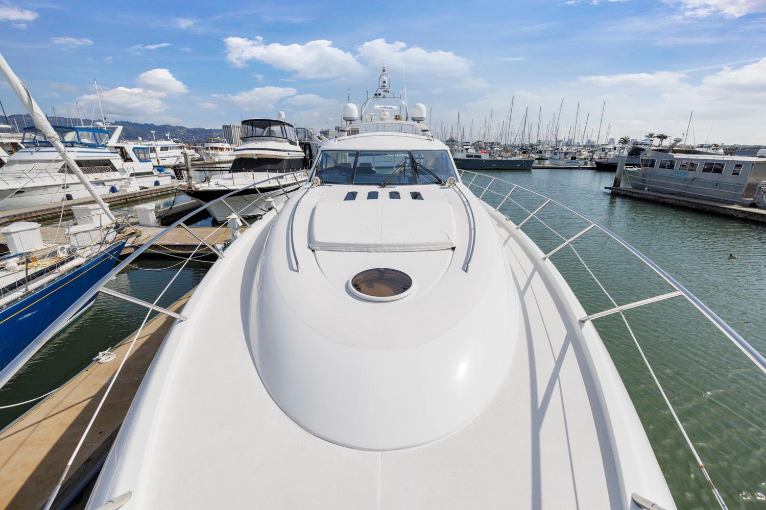 Princess-65 2003-DISMISSED CA-US-Luxury yacht Princess 65, 2003 model, docked in a marina with other boats.-8801006 | Thumbnail