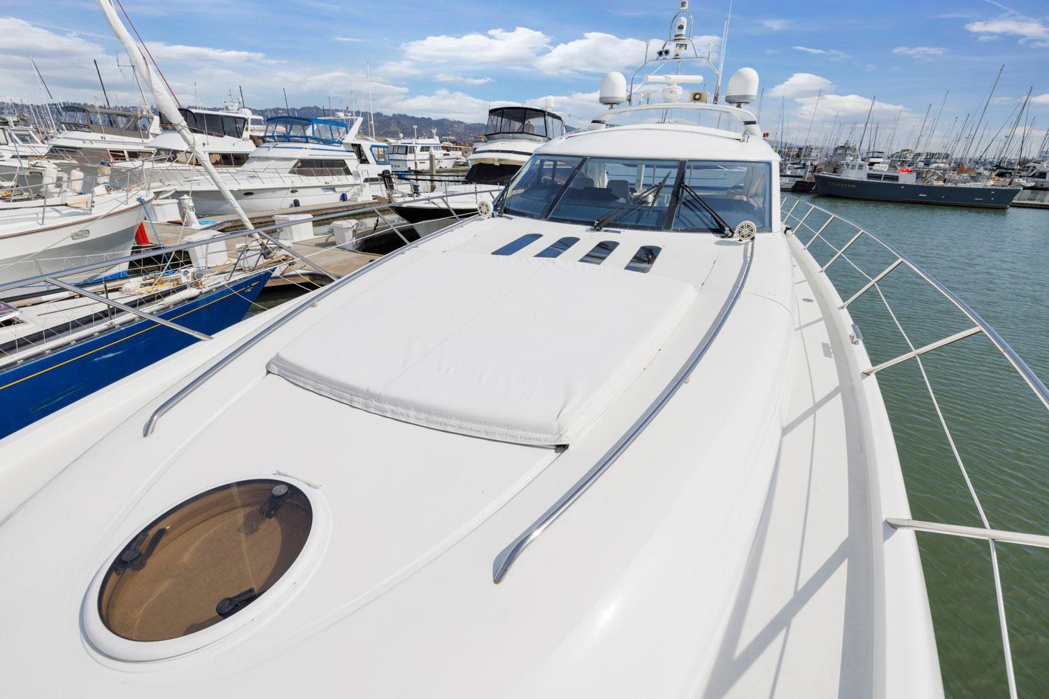 Princess-65 2003-DISMISSED CA-US-2003 Princess 65 yacht docked in a marina, showcasing sleek design and luxury features.-8801006 | Thumbnail
