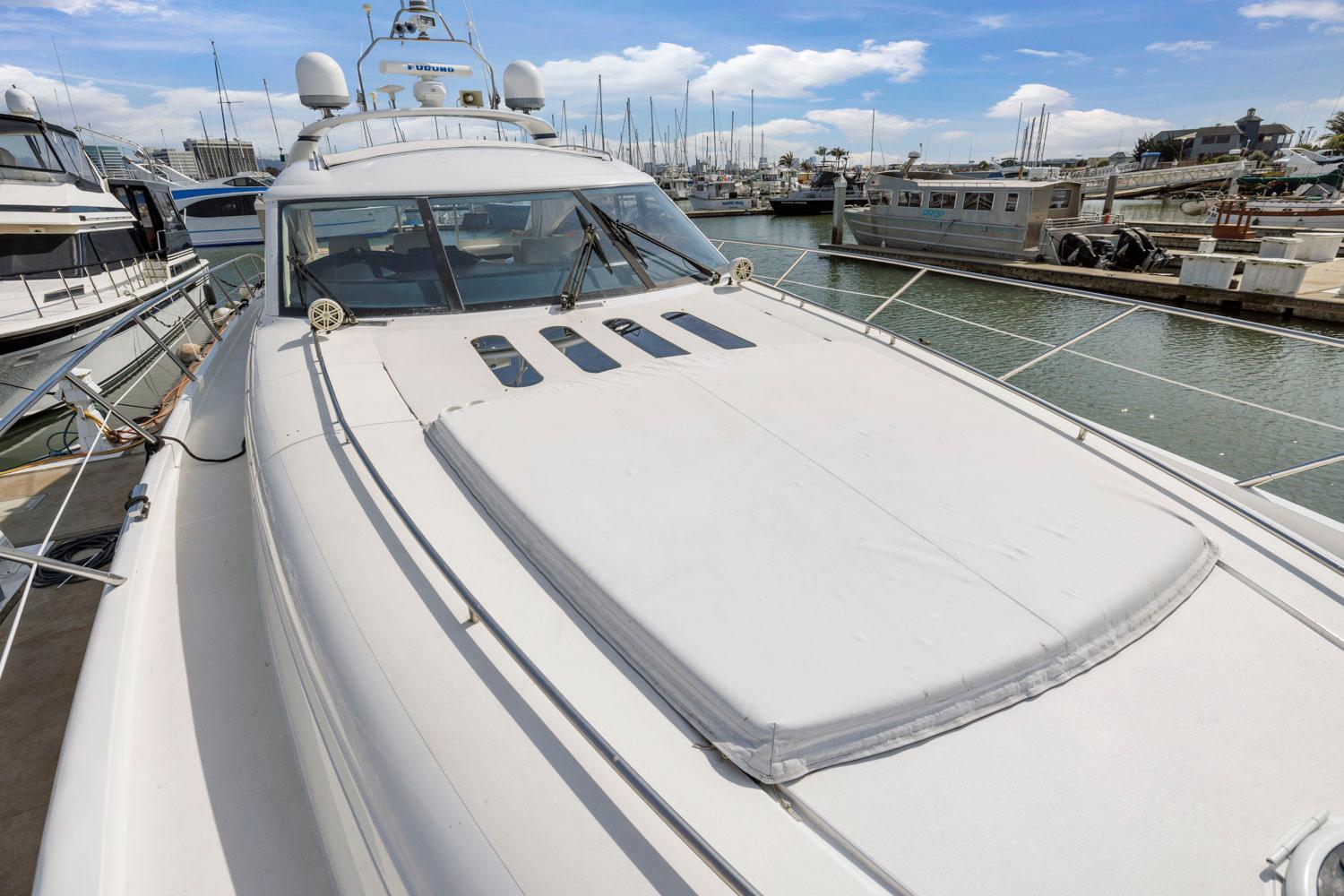 Princess-65 2003-DISMISSED CA-US-Luxury 2003 Princess 65 yacht docked in marina under blue sky.-8801006 | Thumbnail