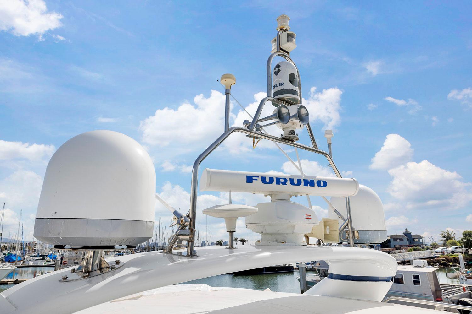 Princess-65 2003-DISMISSED CA-US-Radar and communication equipment on a 2003 Princess 65 yacht under a clear blue sky.-8801006 | Thumbnail