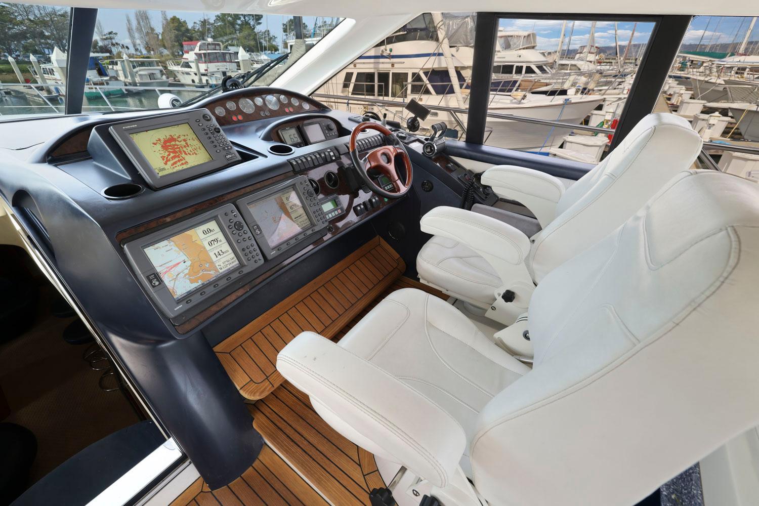 Princess-65 2003-DISMISSED CA-US-Luxurious 2003 Princess 65 yacht cockpit with advanced navigation systems and plush seating.-8801006 | Thumbnail