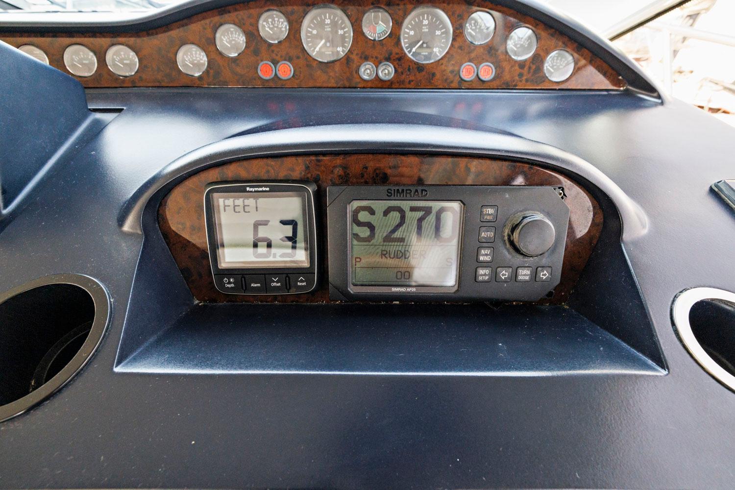 Princess-65 2003-DISMISSED CA-US-Control panel of a 2003 Princess 65 yacht with navigation instruments.-8801006 | Thumbnail