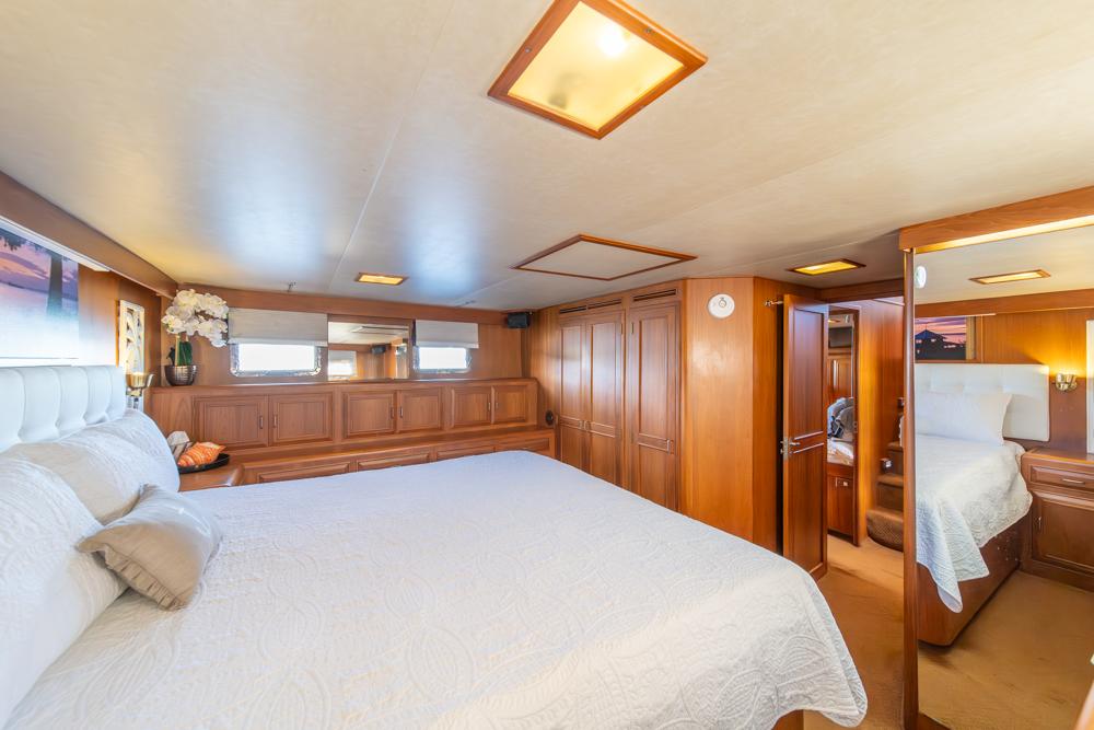 Ocean Alexander-Cockpit M/Y 1986-Take Chances WA-US-Luxurious 1986 Ocean Alexander Cockpit M/Y bedroom with elegant wood paneling and plush bedding.-9621089 | Thumbnail