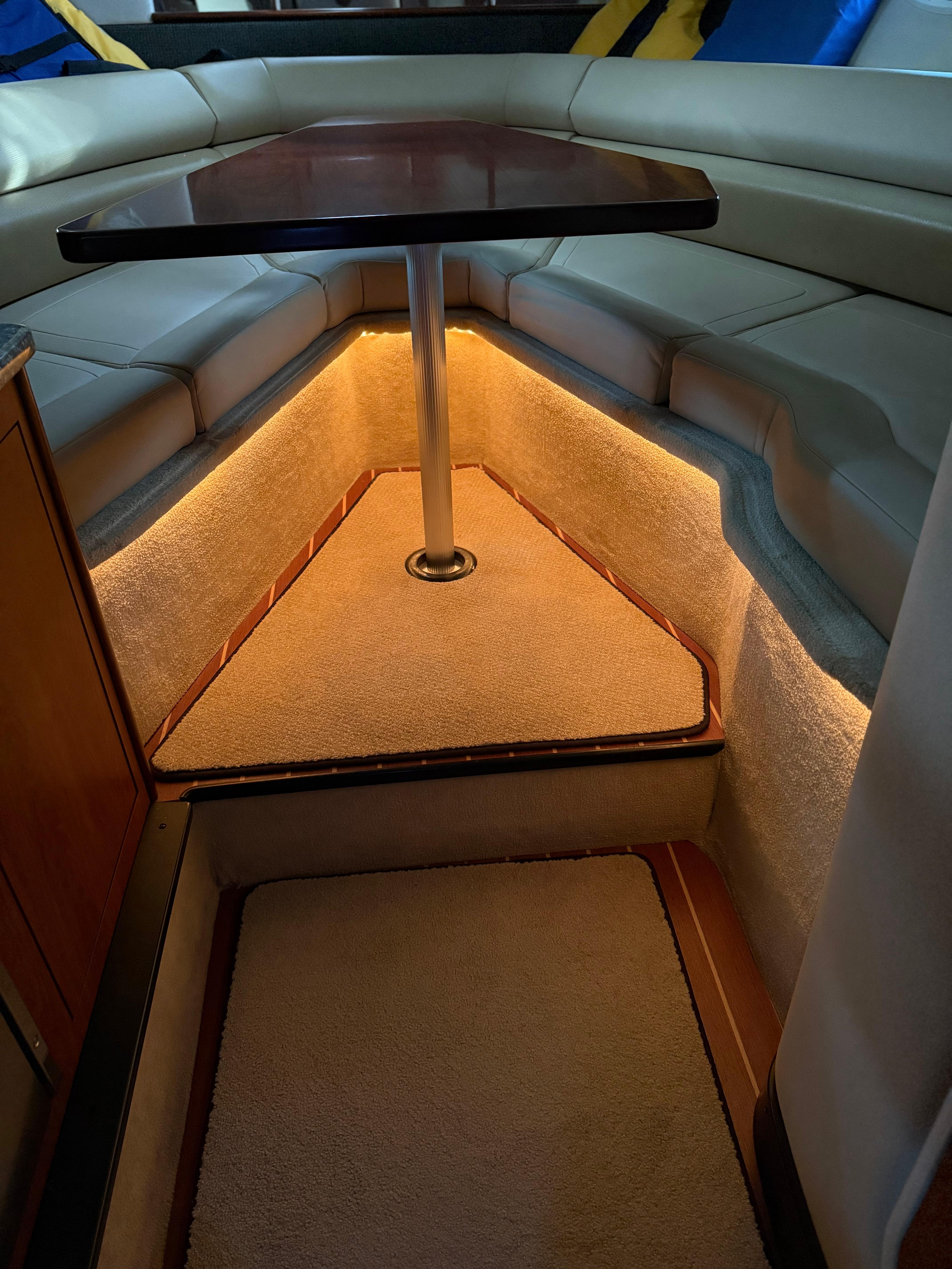 2009 Monterey 280 SCR interior with cozy seating and ambient lighting.