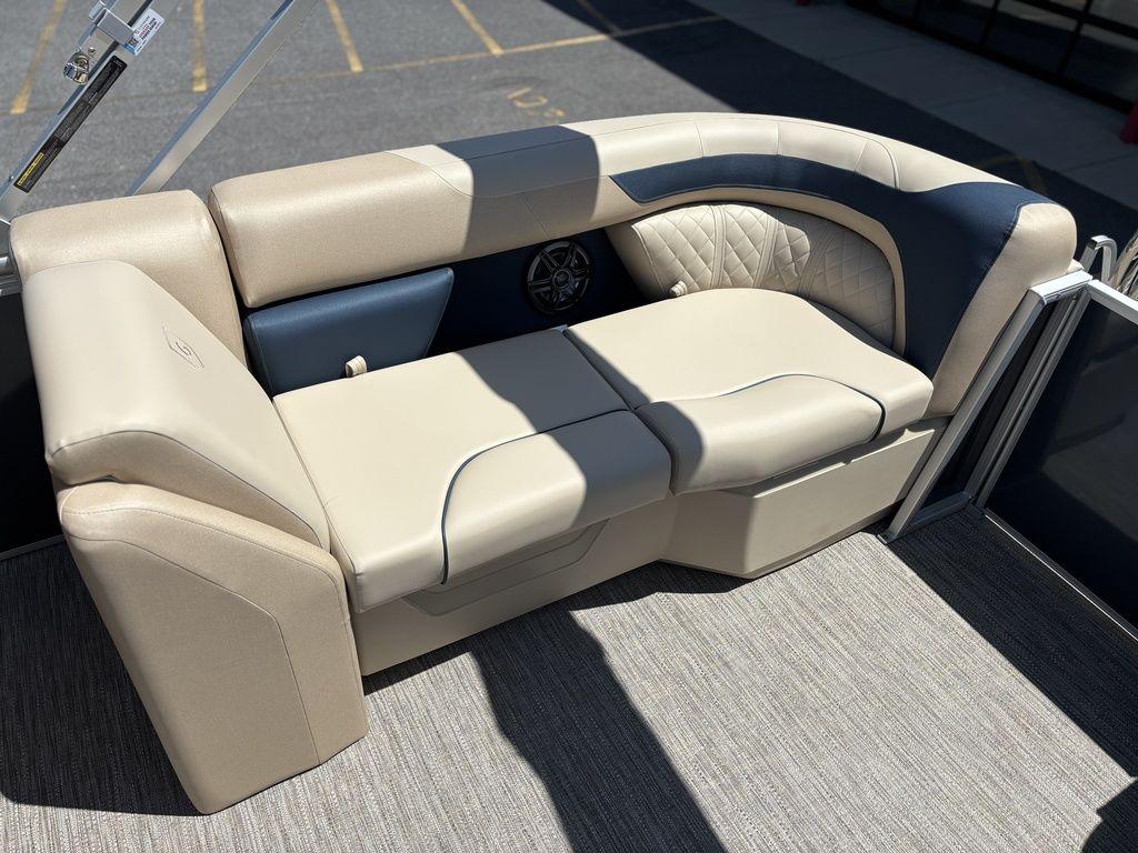 Luxurious seating on 2025 Godfrey SWEETWATER 2286 SB pontoon boat, featuring beige and navy upholstery.