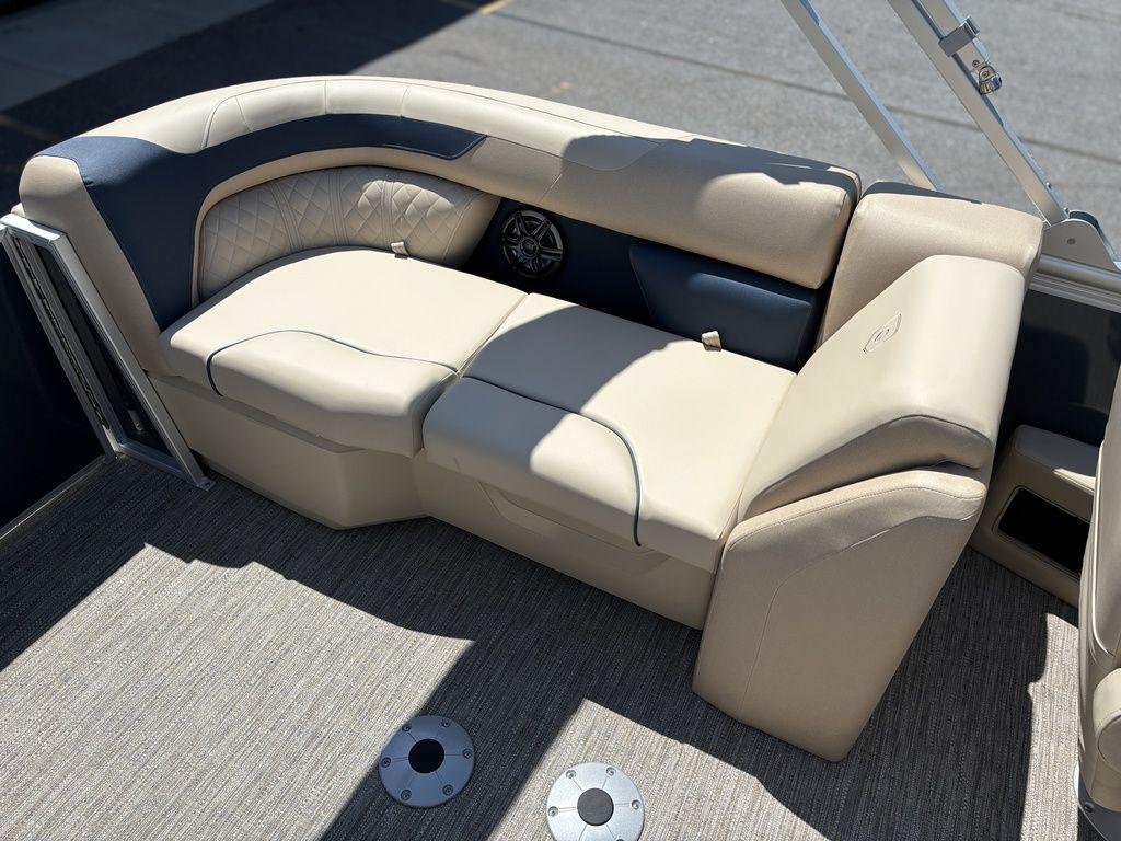 Luxurious seating on 2025 Godfrey SWEETWATER 2286 SB pontoon boat, featuring beige upholstery.