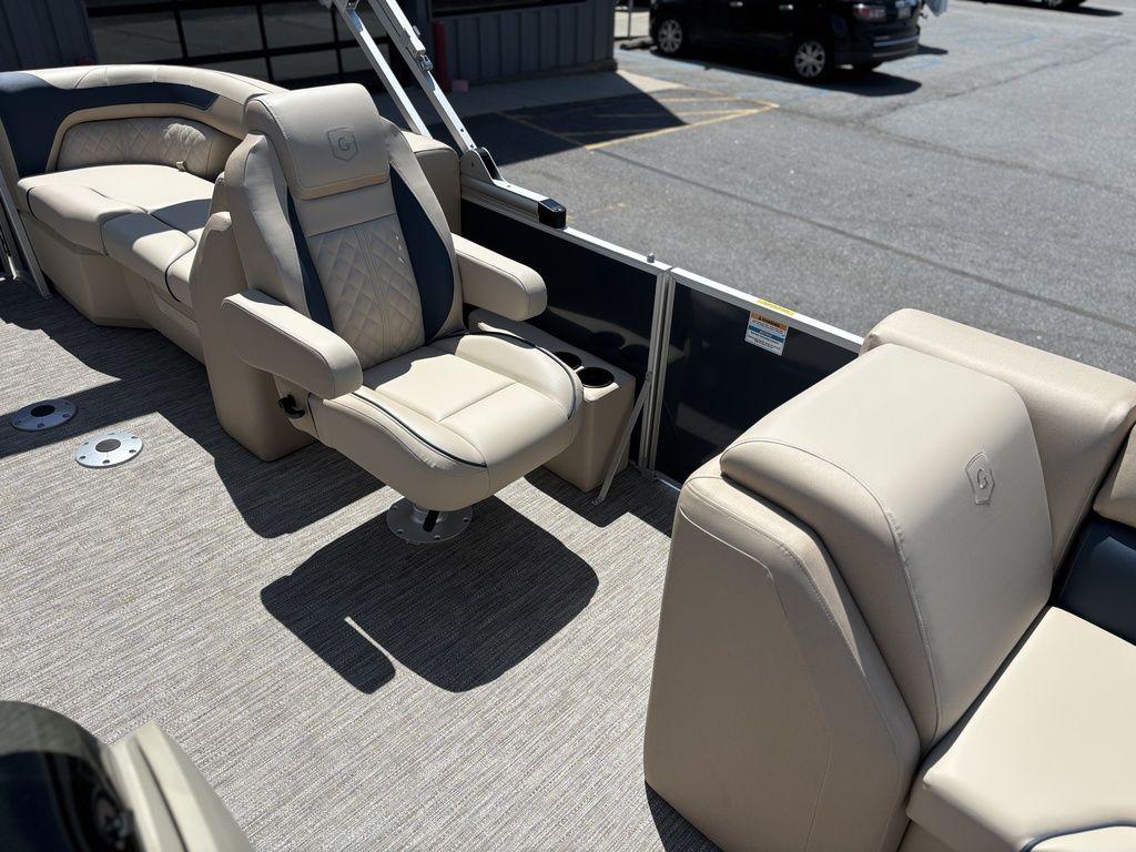2025 Godfrey SWEETWATER 2286 SB boat interior with beige seating and modern design.