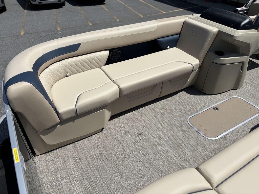 2025 Godfrey SWEETWATER 2286 SB boat interior with beige seating and modern design.