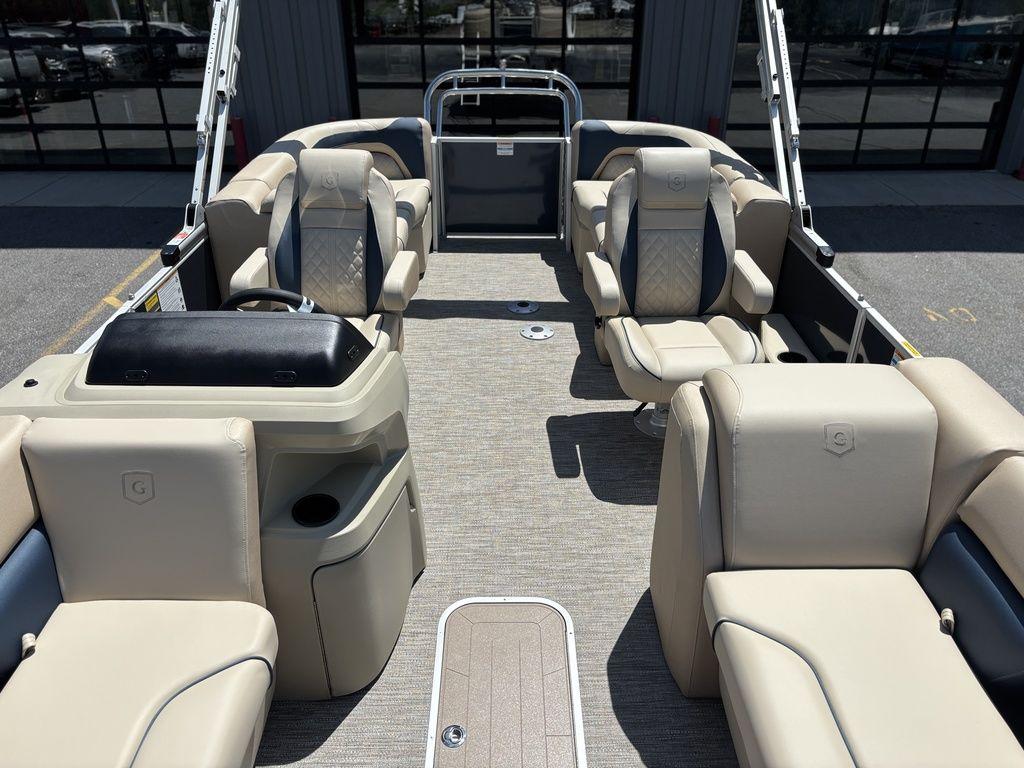 2025 Godfrey SWEETWATER 2286 SB pontoon boat with beige seating and modern interior design.