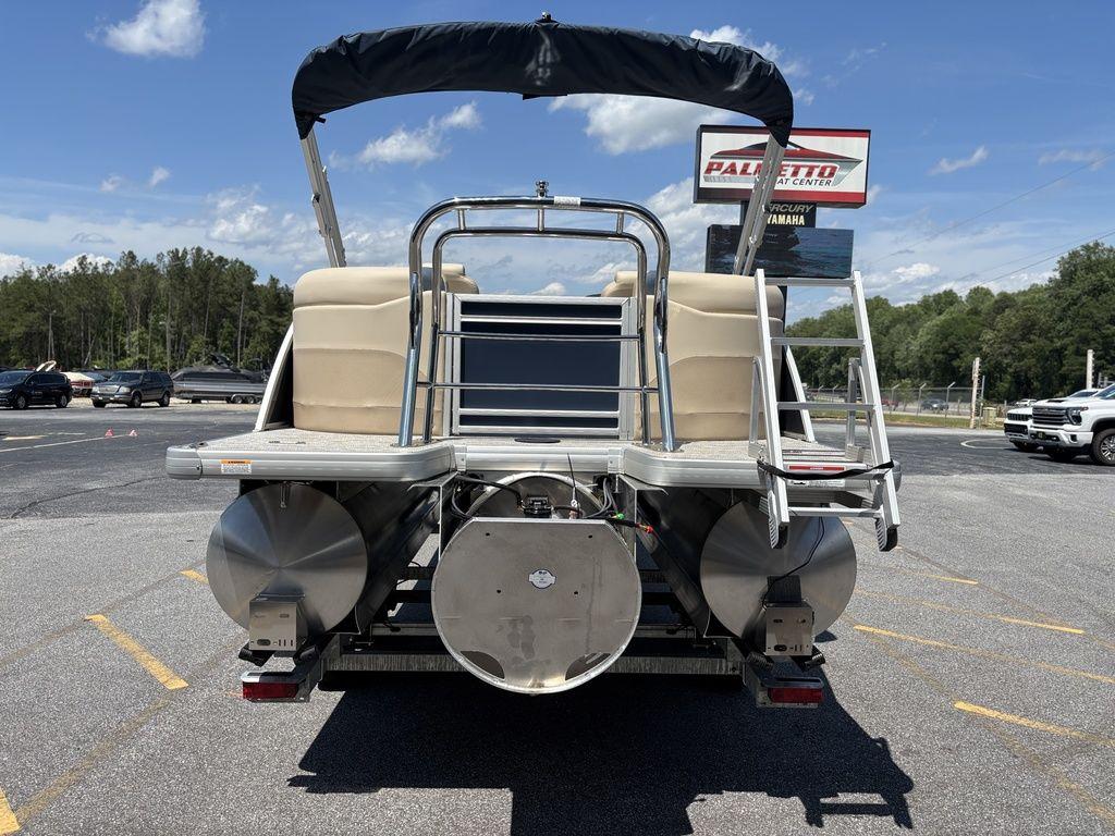 2025 Godfrey SWEETWATER 2286 SB pontoon boat, rear view, parked outdoors.