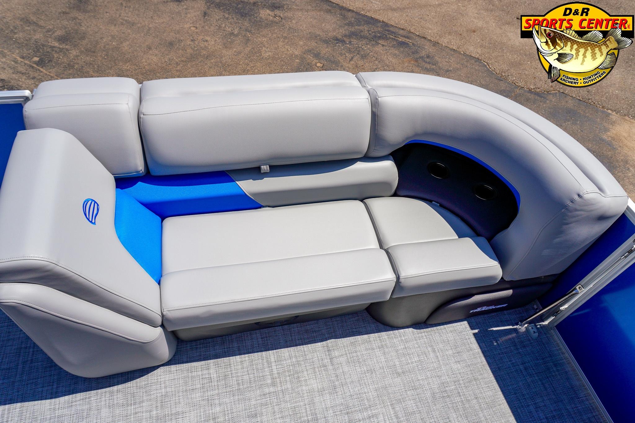 2026 Sun Tracker Party Barge 20 DLX pontoon boat with gray and blue seating.