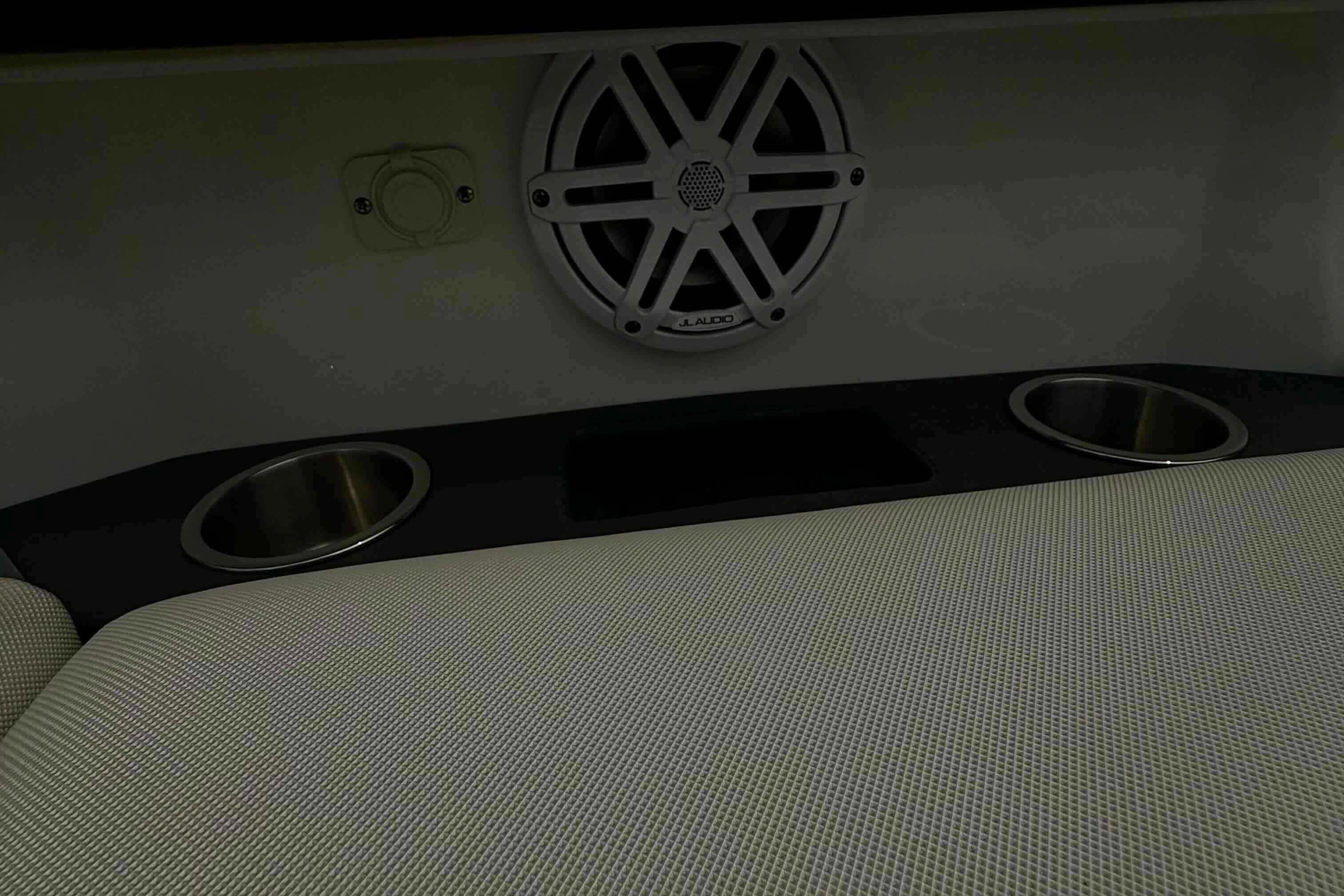 Interior of 2020 Formula 290 Bowrider with speaker and cup holders.