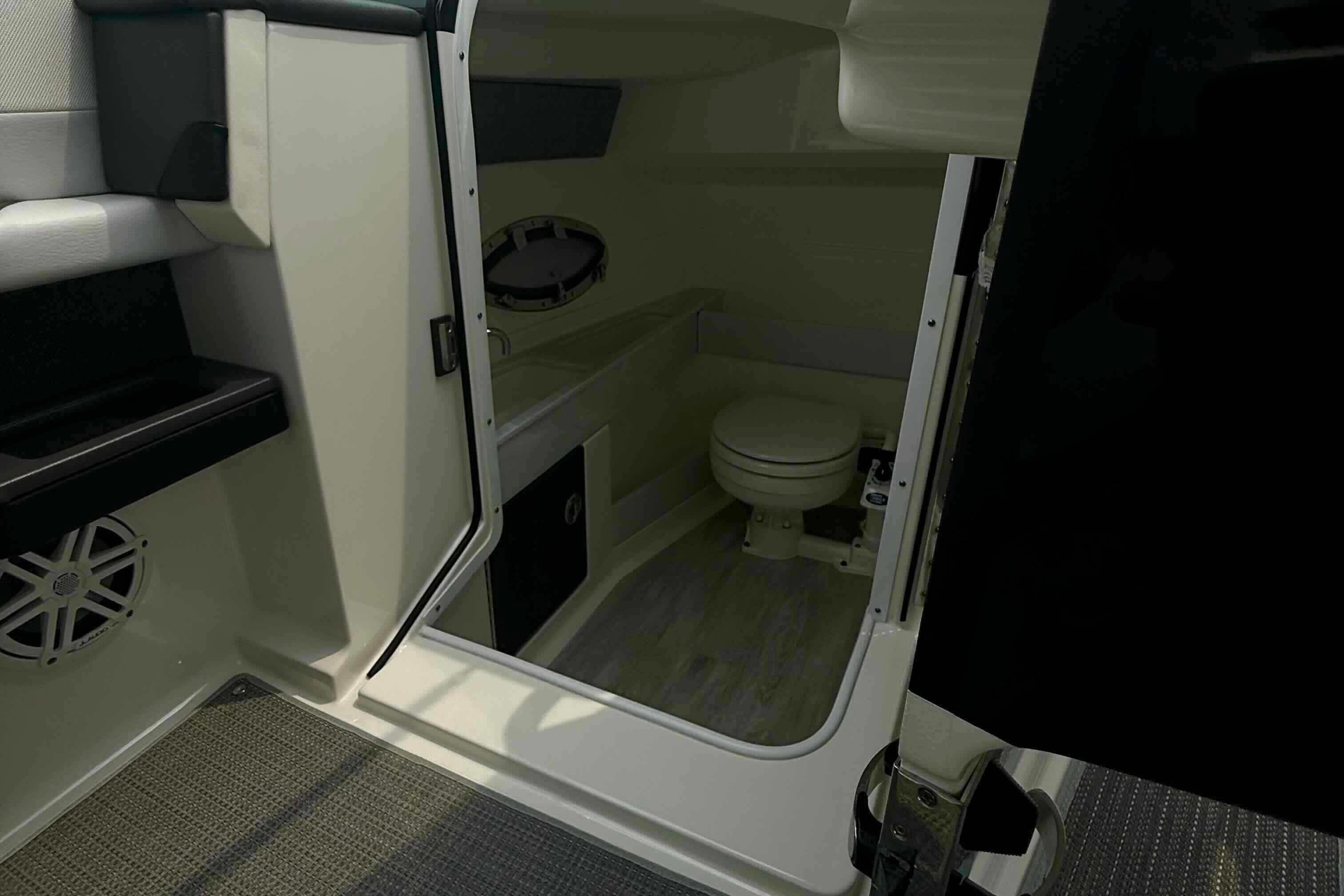 2020 Formula 290 Bowrider interior cabin with toilet and modern design.