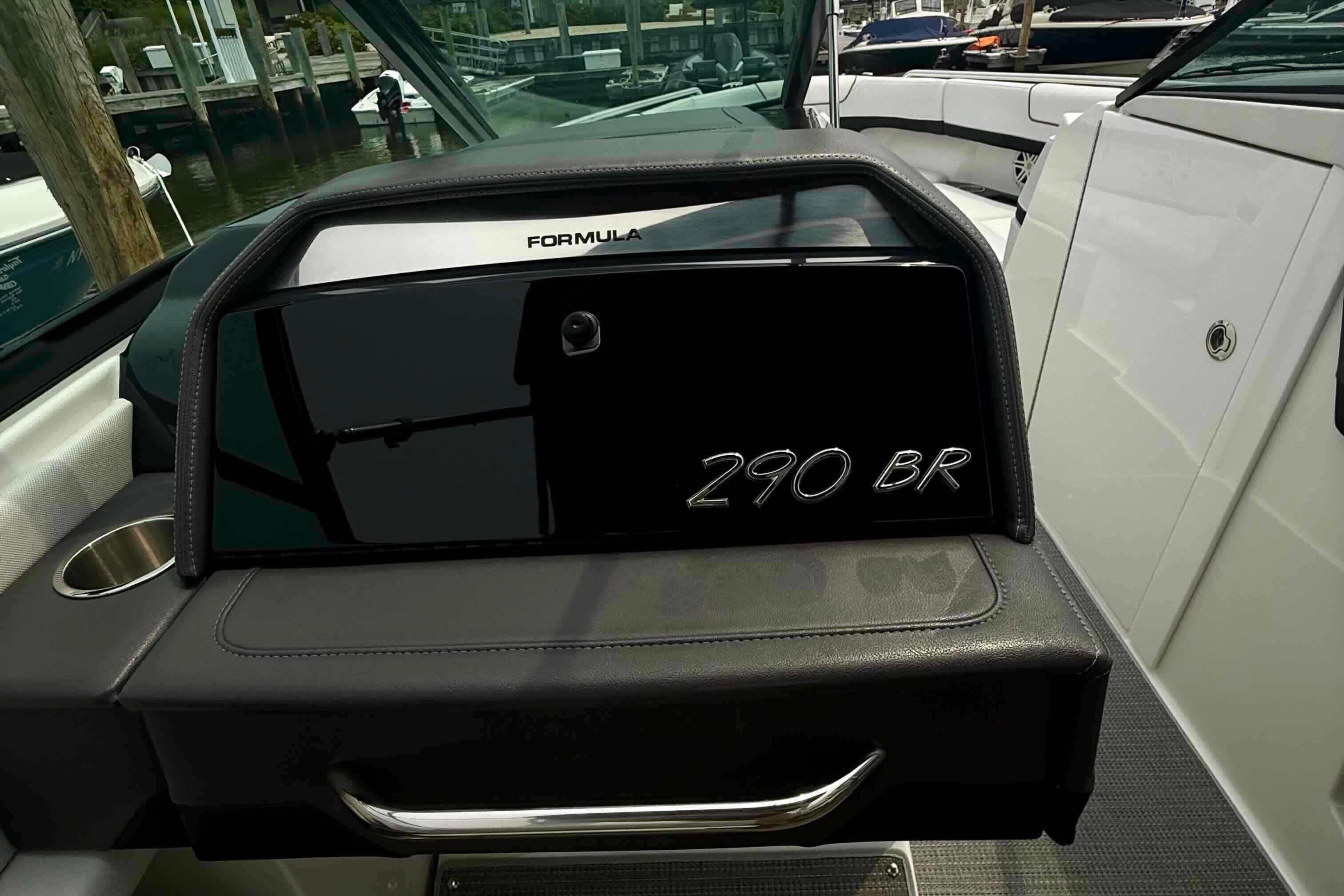 2020 Formula 290 Bowrider dashboard with sleek design and cup holder.