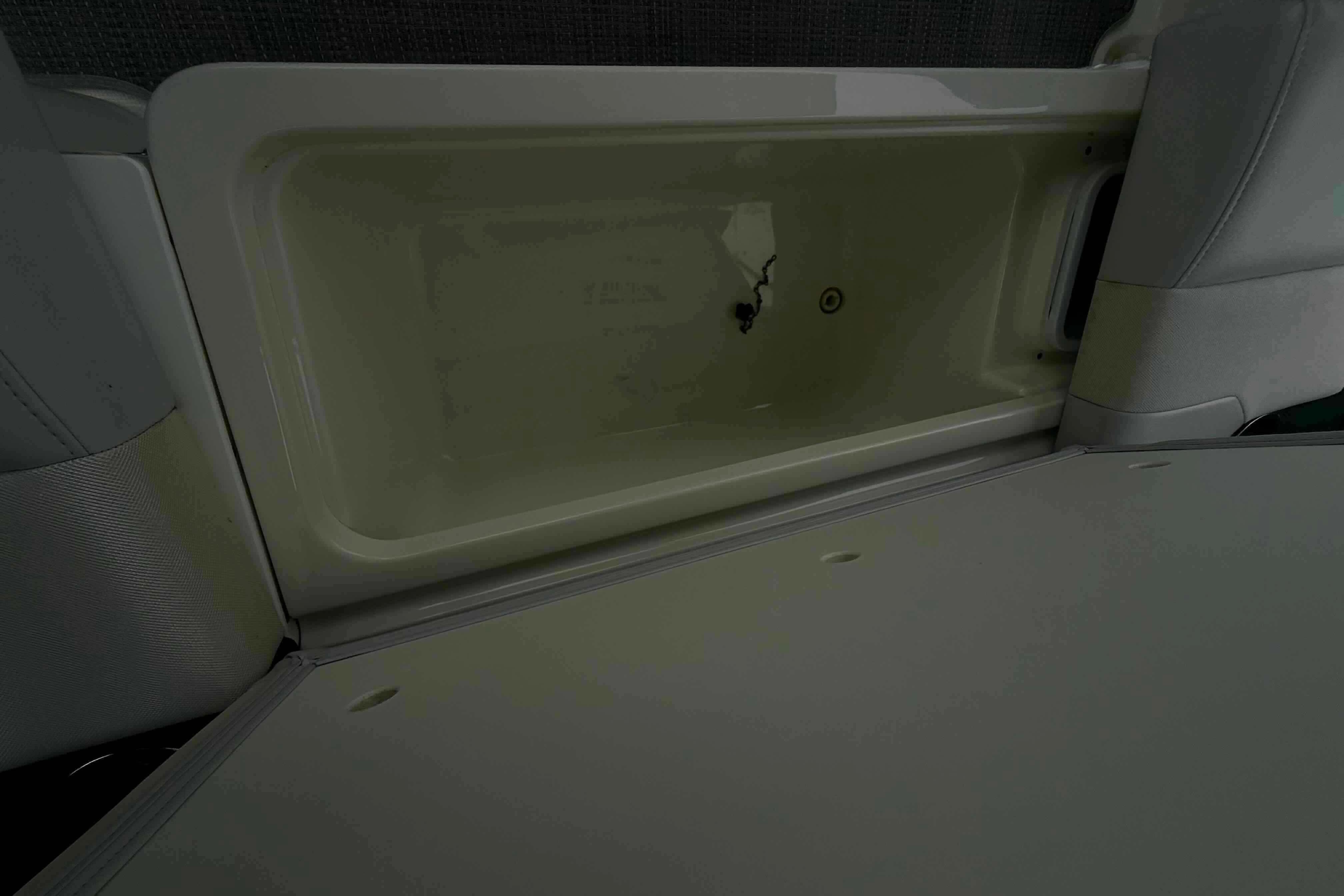 Storage compartment in 2020 Formula 290 Bowrider boat interior.