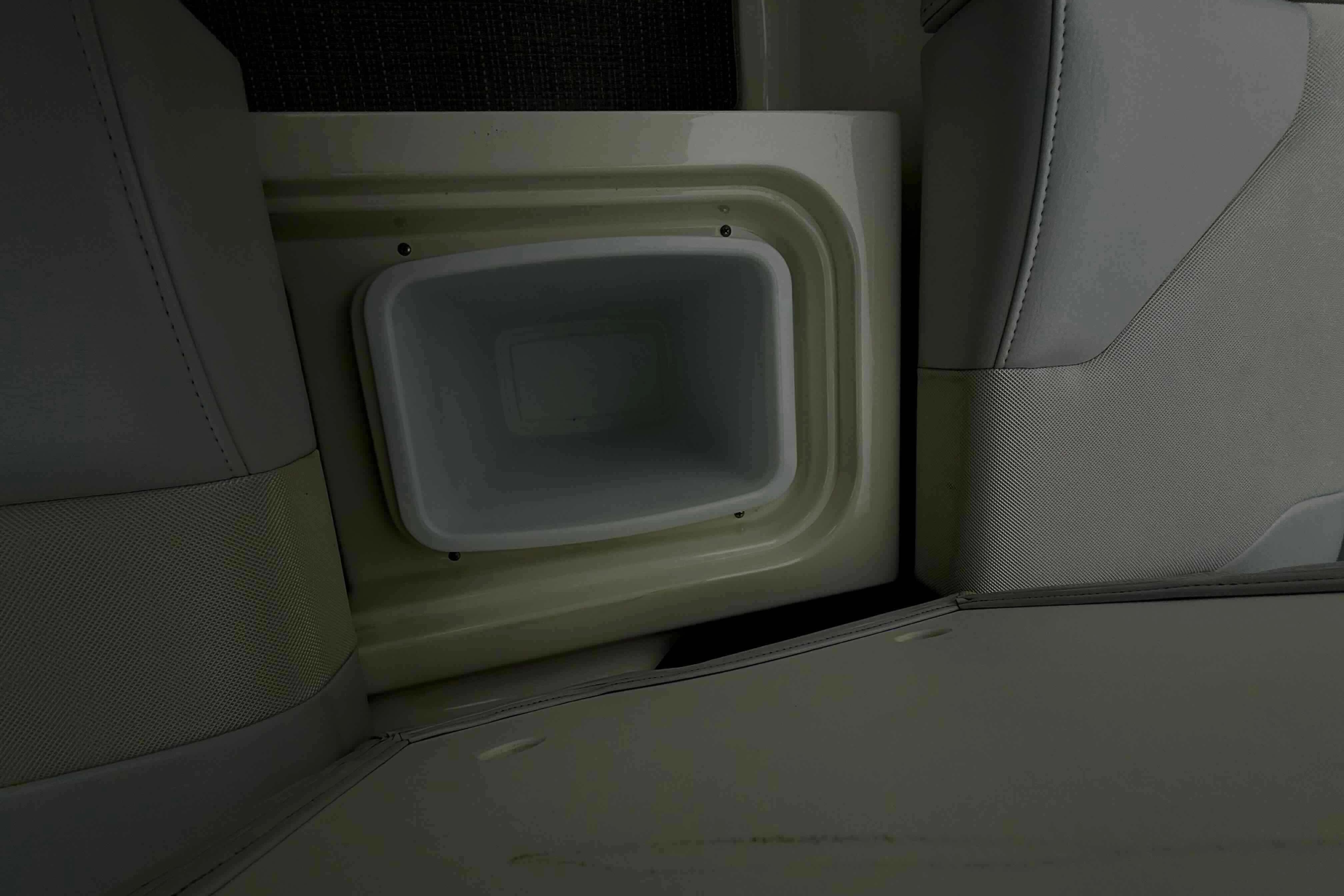 Interior view of a 2020 Formula 290 Bowrider boat, featuring a built-in storage compartment.