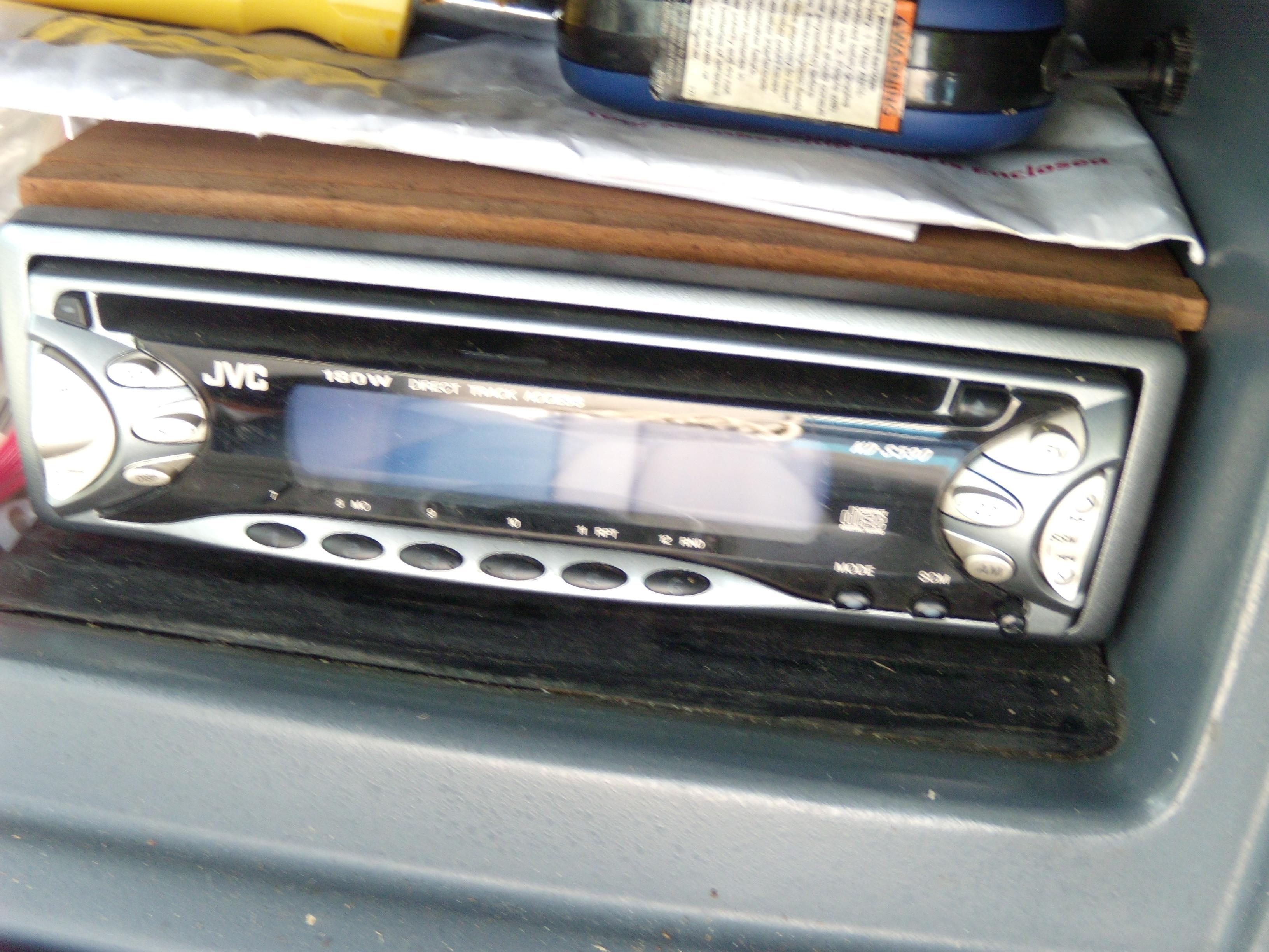 JVC car stereo installed in a 1989 Chaparral 2300 SX Sport dashboard.