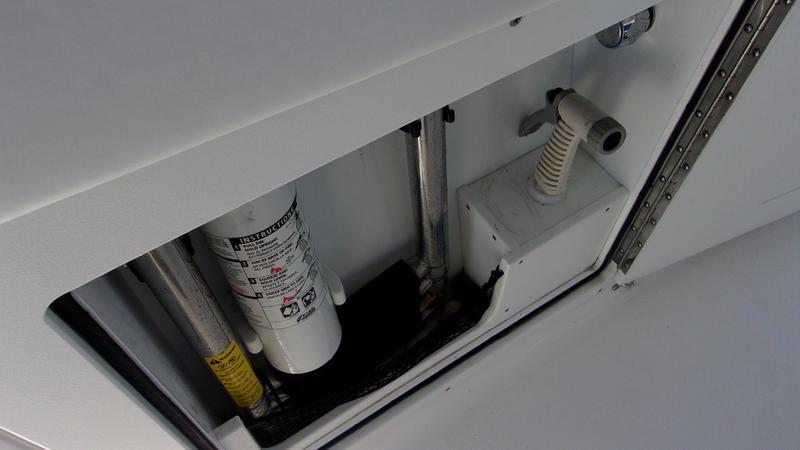 Crevalle-33 CSF Offshore Fishing 2022 -FL-US-2022 Crevalle 33 CSF Offshore Fishing boat interior compartment with equipment and wiring.-9541276 | Thumbnail