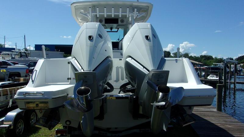 Crevalle-33 CSF Offshore Fishing 2022 -FL-US-2022 Crevalle 33 CSF Offshore Fishing boat with dual outboard engines at dock.-9541276 | Thumbnail