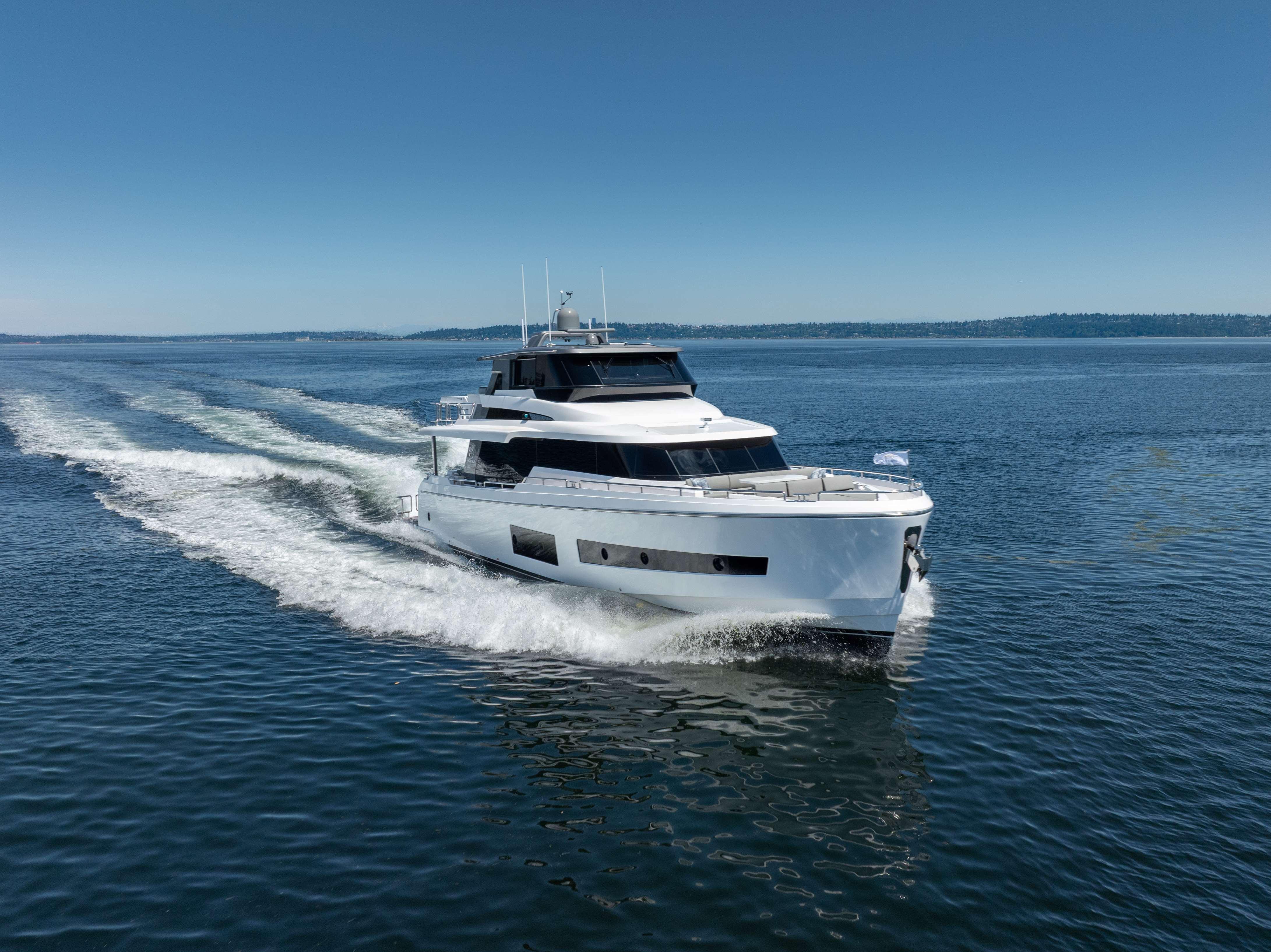 Horizon-V68 2025-V68-612 / NOW AVAILABLE FL-US-Luxurious 2025 Horizon V68 yacht cruising on open water under clear blue skies.-9631300