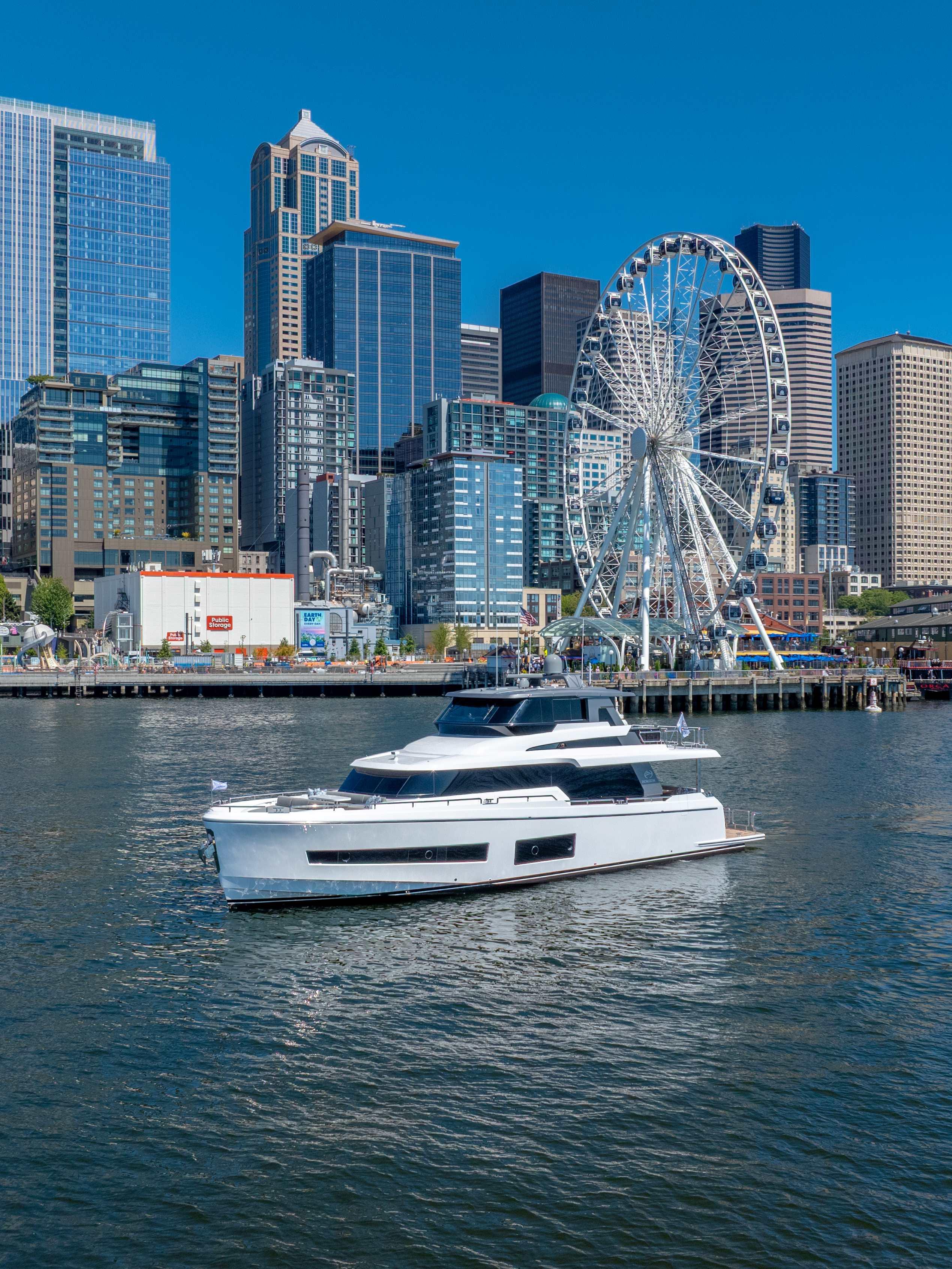 Horizon-V68 2025-V68-612 / NOW AVAILABLE FL-US-2025 Horizon V68 yacht cruising near city skyline and Ferris wheel.-9631300 | Thumbnail