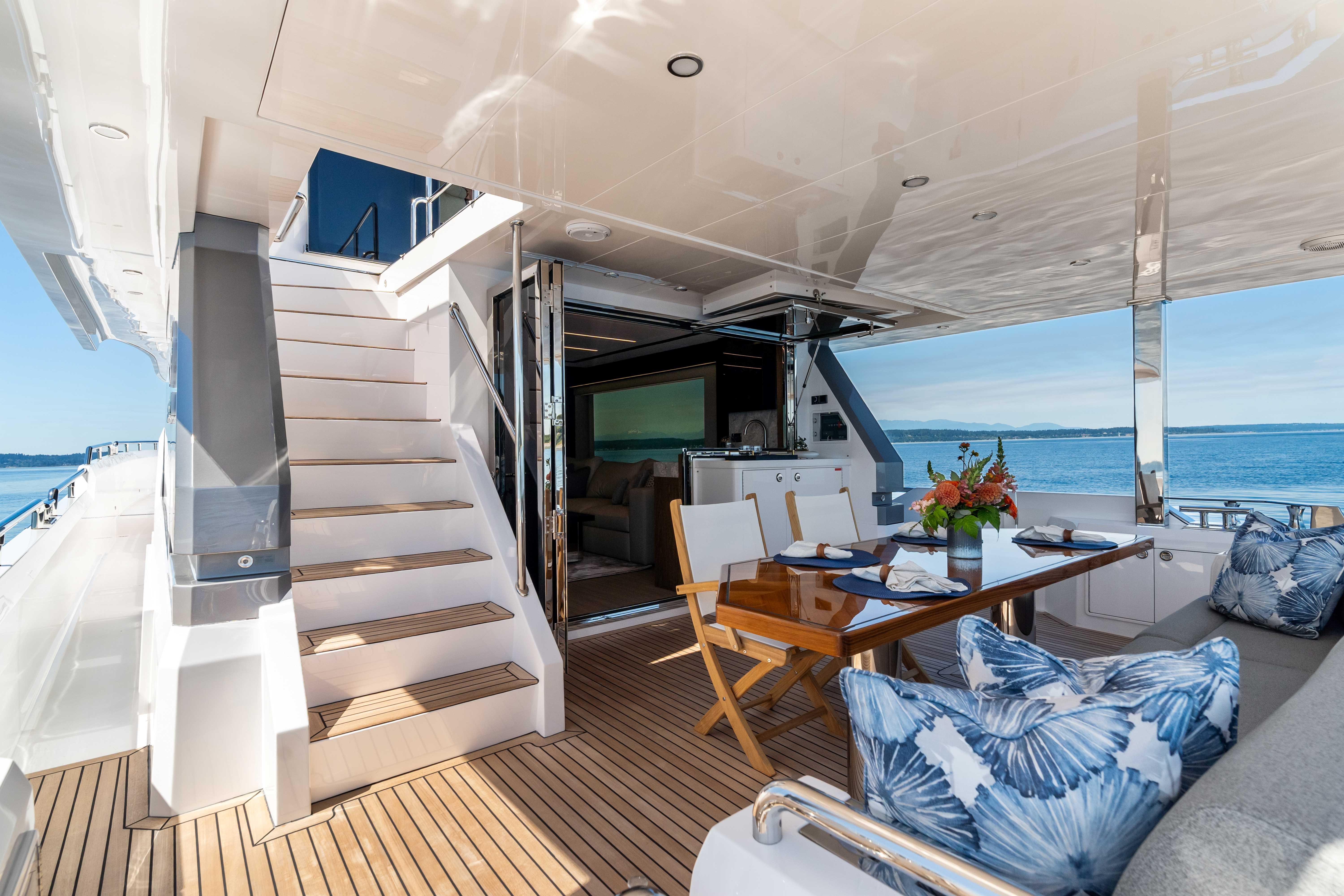 Horizon-V68 2025-V68-612 / NOW AVAILABLE FL-US-Luxurious Horizon V68 yacht deck with dining area, ocean view, and elegant decor, 2025 model.-9631300 | Thumbnail