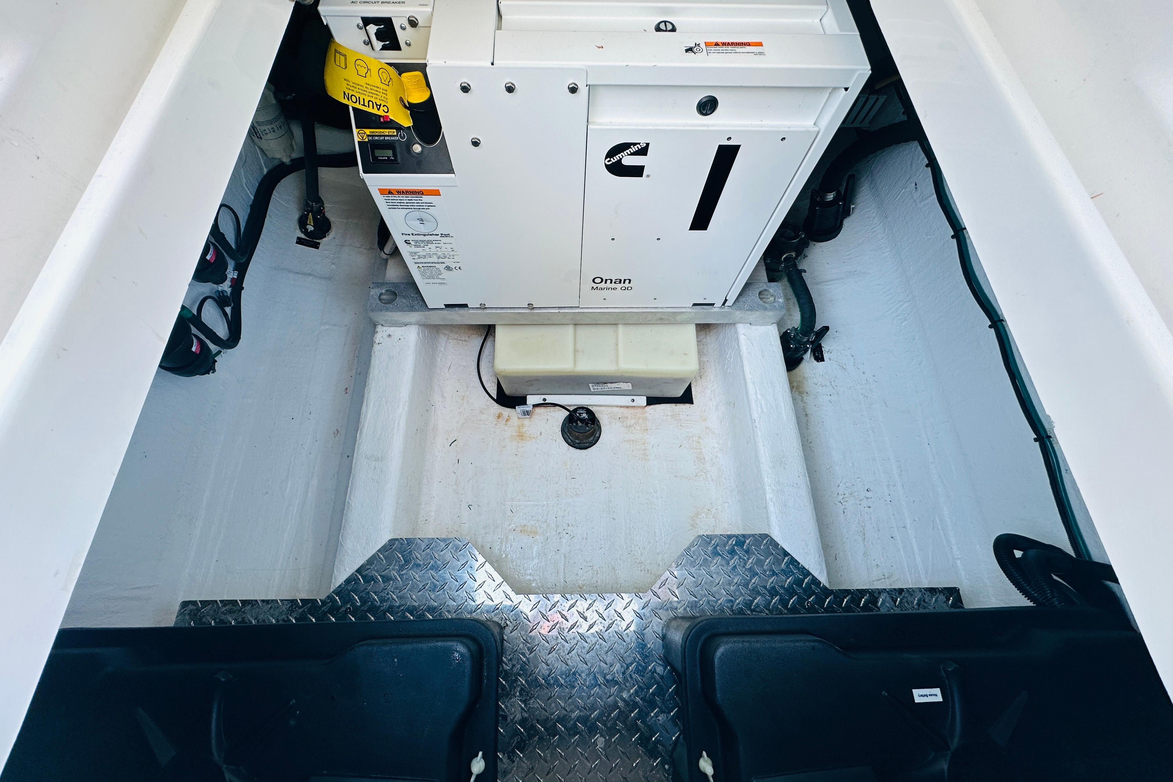 2024 Back Cove 34O engine compartment with Cummins Onan Marine generator.