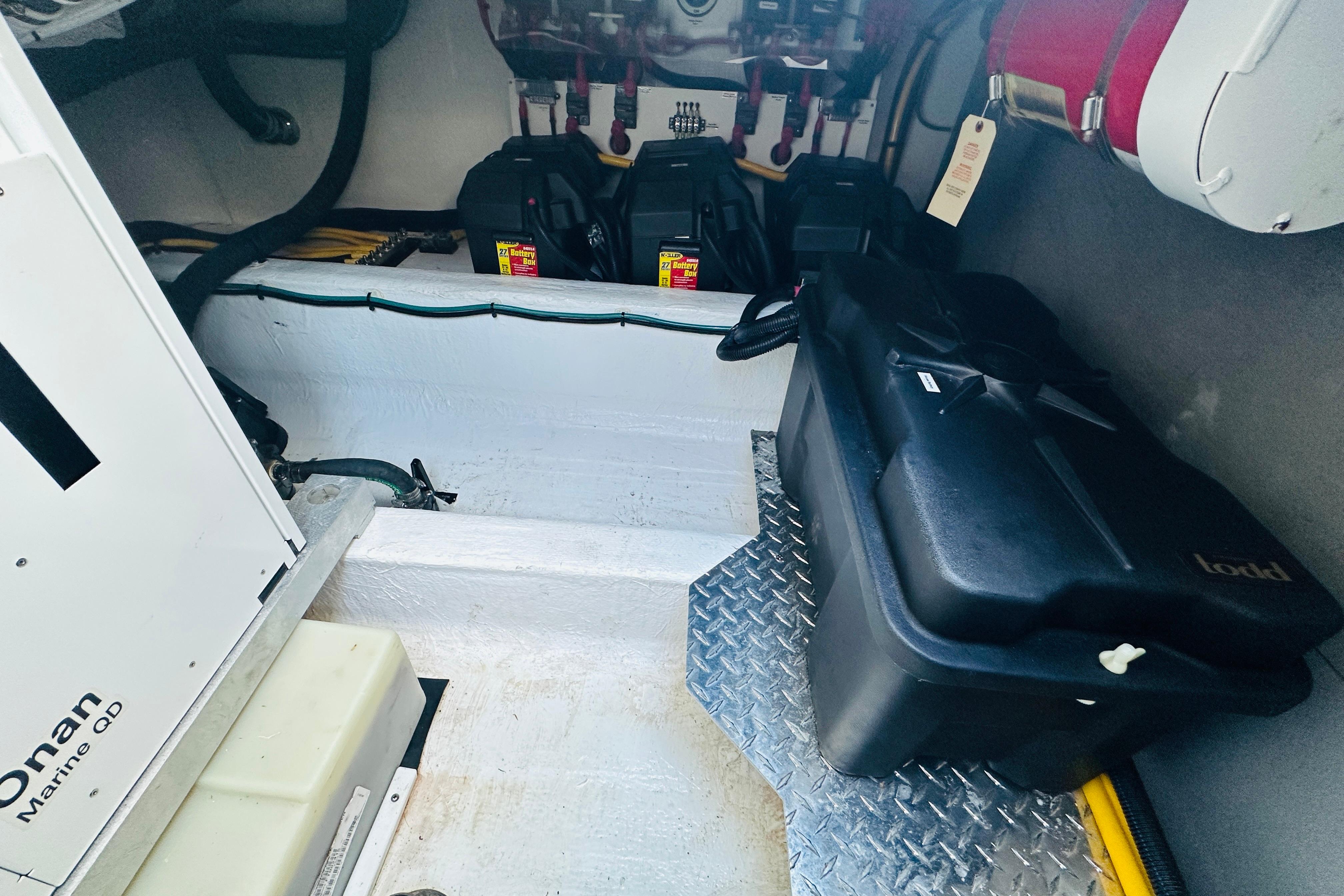 Engine compartment of 2024 Back Cove 34O with Onan Marine QD generator.