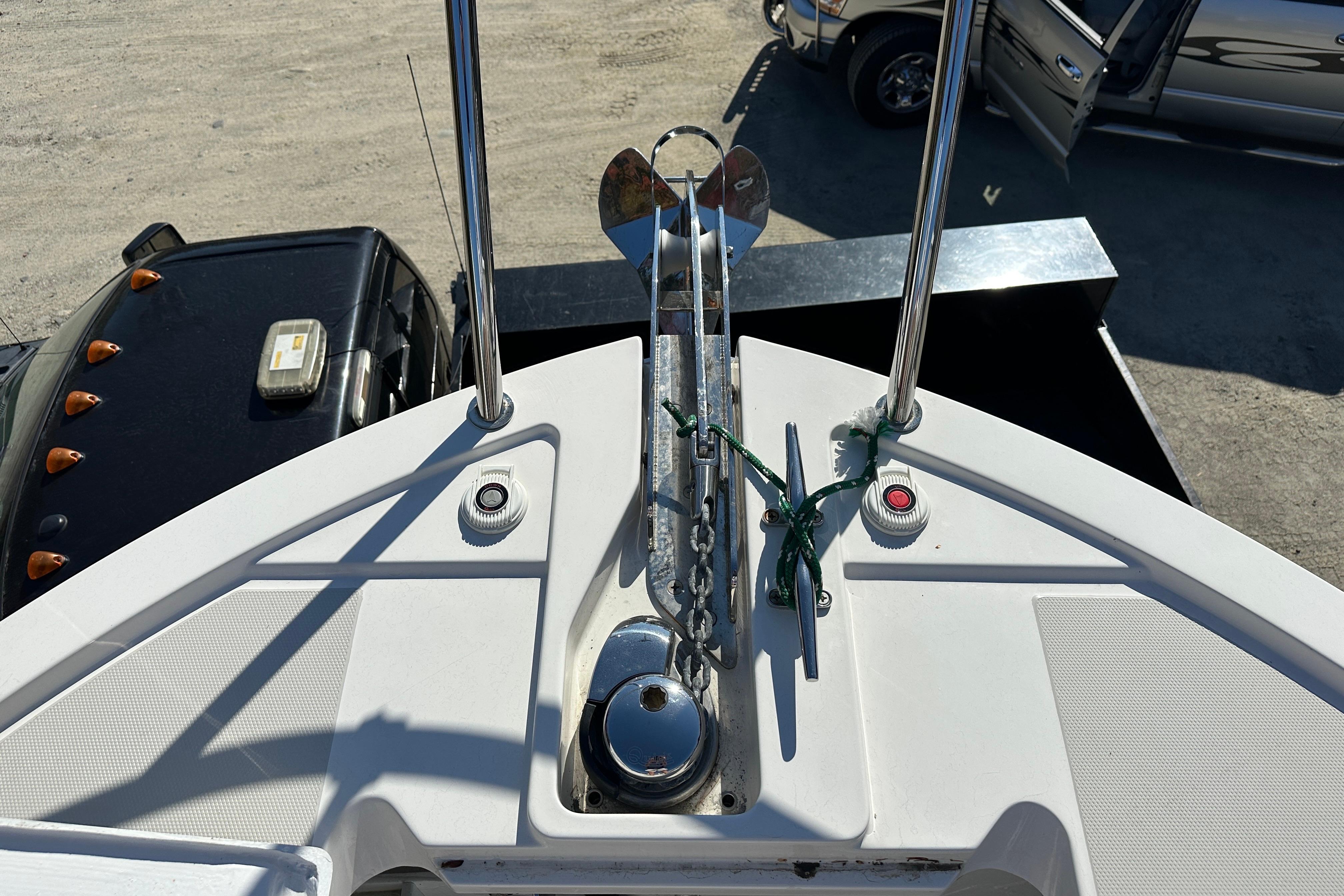 2024 Back Cove 34O boat anchor system with chain and cleat on deck.