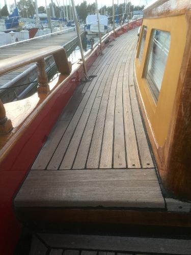 1971 Formosa 41 sailboat deck with wooden finish and vibrant cabin colors.