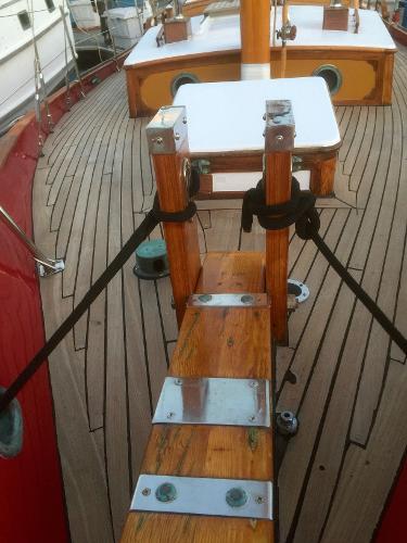 1971 Formosa 41 sailboat deck with wooden details and metal fittings.