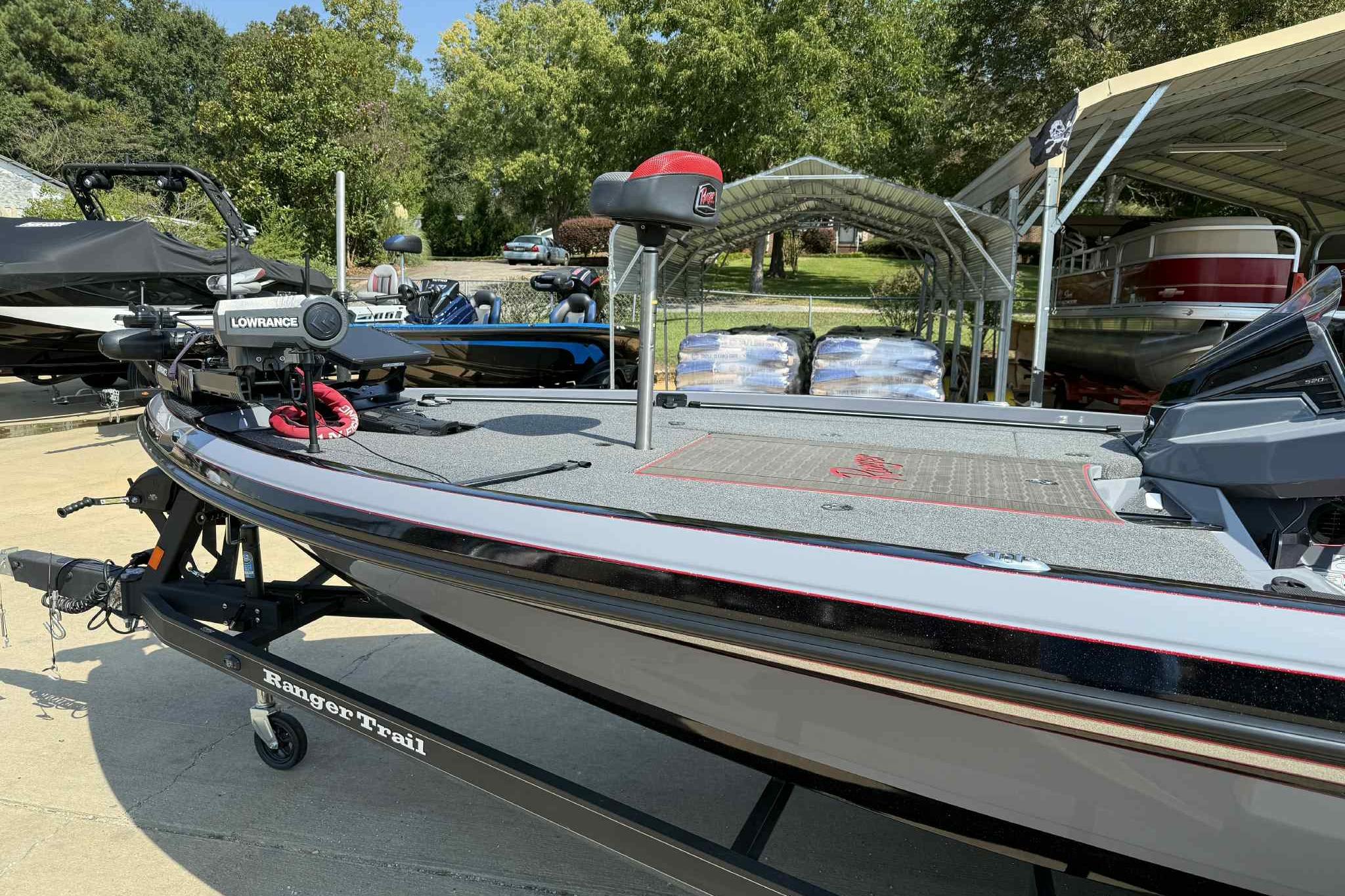 2023 Ranger Z520R 55th Anniversary Limited Edition boat with Lowrance equipment, parked outdoors.