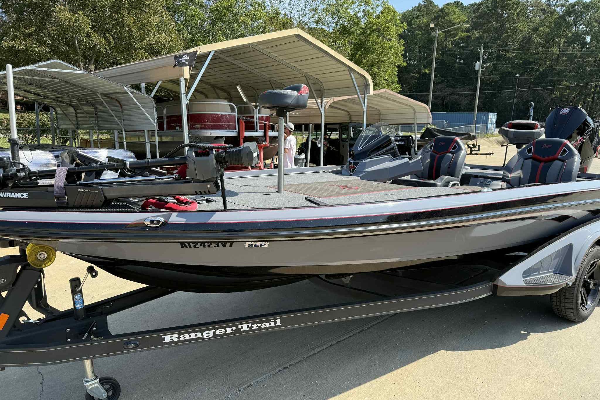 2023 Ranger Z520R 55th Anniversary Limited Edition boat on trailer, parked outdoors.