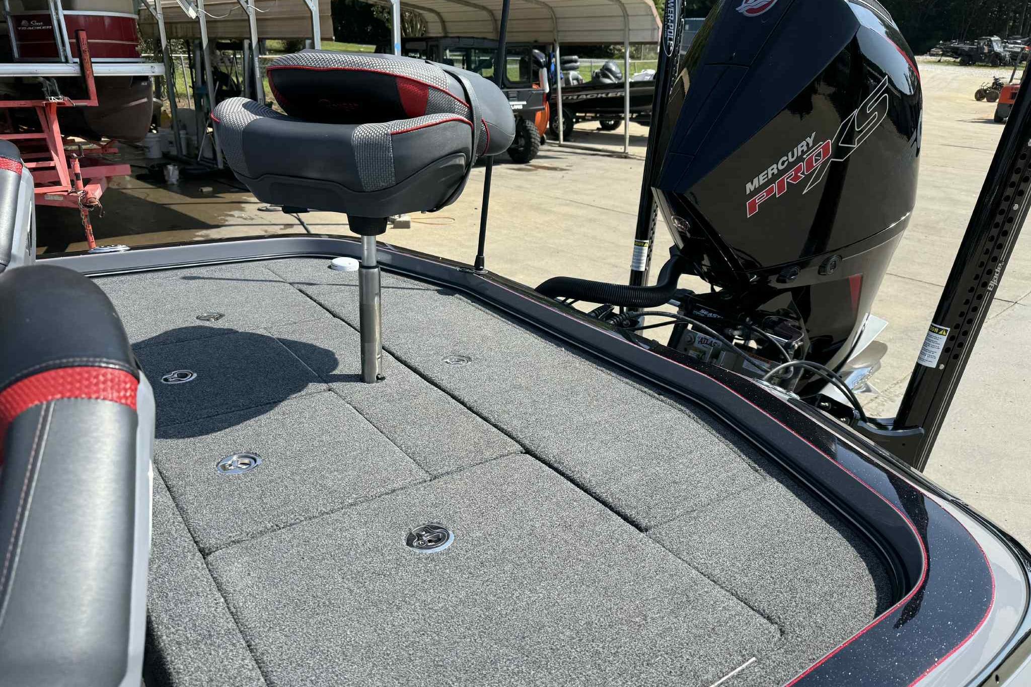 2023 Ranger Z520R 55th Anniversary boat with Mercury Pro XS engine, featuring a cushioned seat.