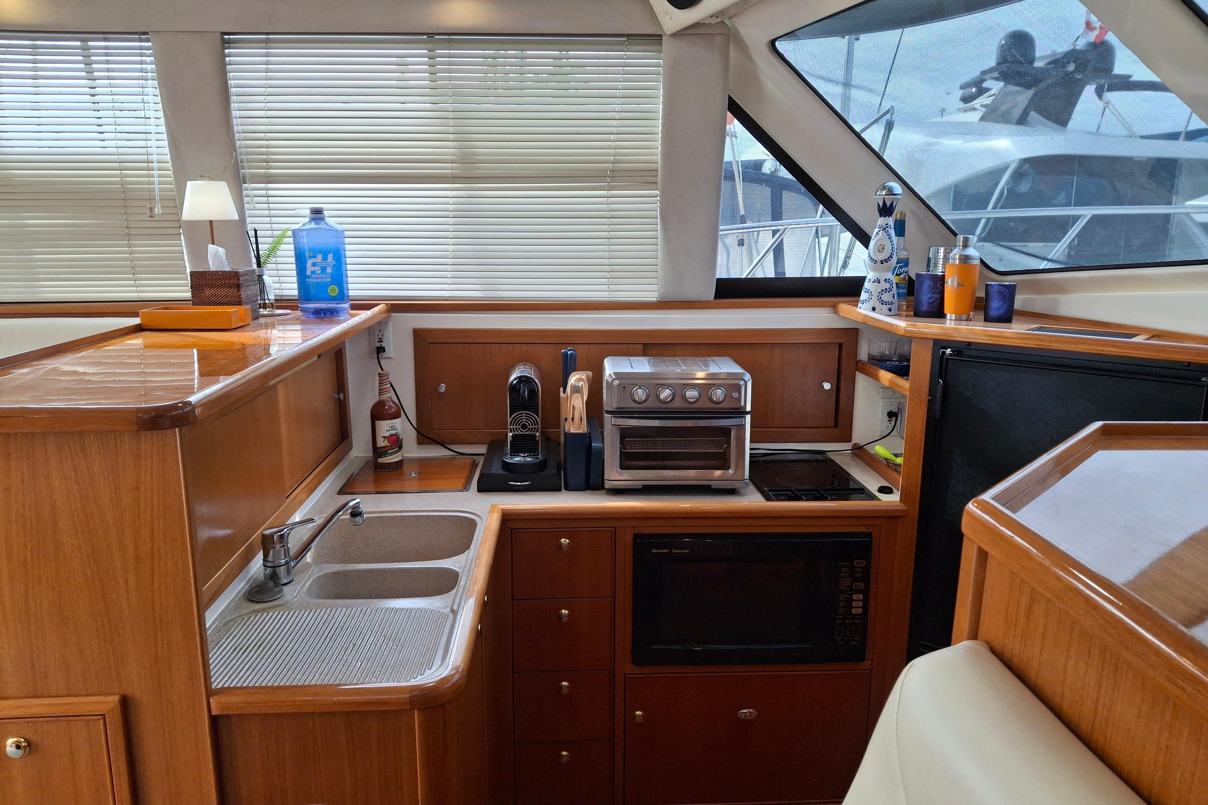 2000 Riviera ENCLOSED FLYBRIDGE # inventory image at Sun Country Yachts, South Lake Union (Seattle)