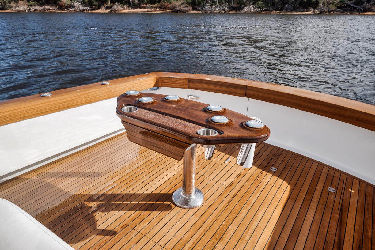 Garlington-44 Express 1996 -FL-US-Garlington 44 Express 1996 yacht deck with wooden flooring and fishing rod holders.-9651424 | Thumbnail