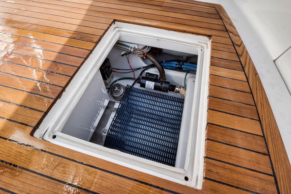 Garlington-44 Express 1996 -FL-US-Open hatch on 1996 Garlington 44 Express boat deck, revealing internal components.-9651424 | Thumbnail