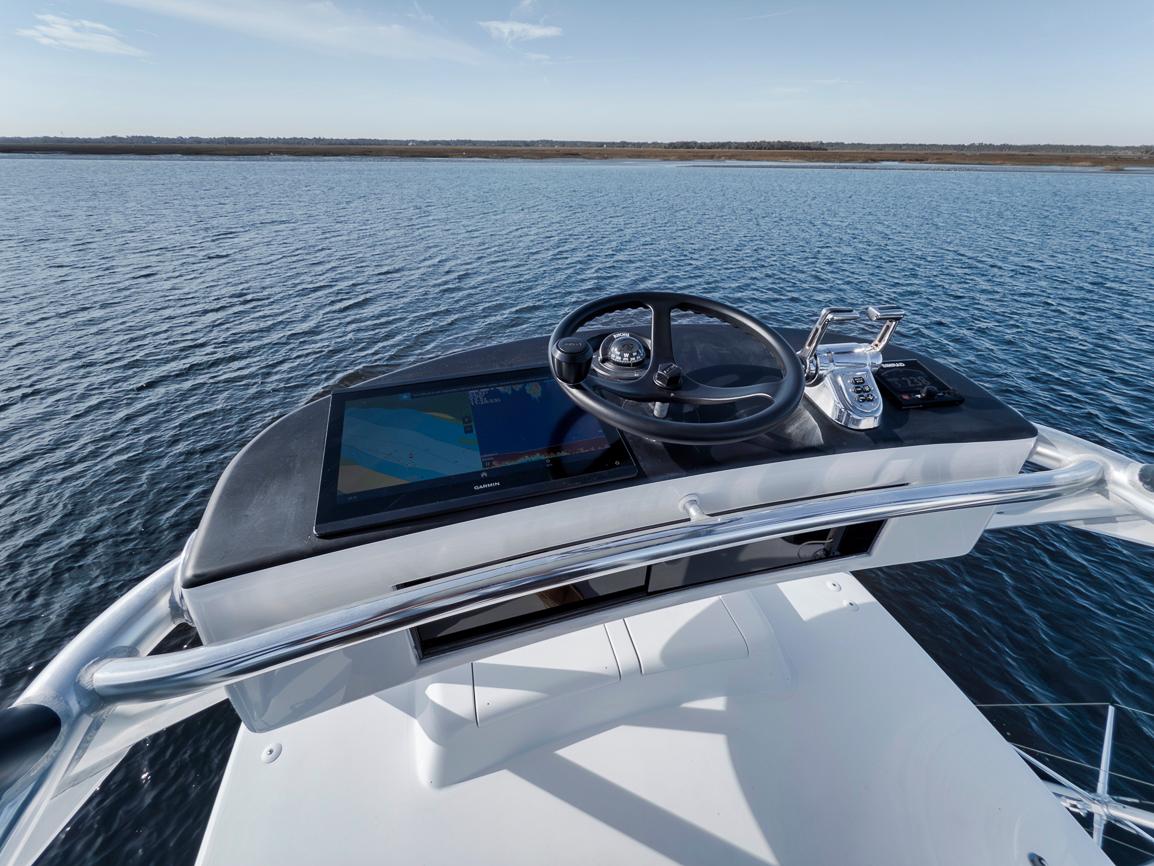 Garlington-44 Express 1996 -FL-US-Helm of 1996 Garlington 44 Express yacht on open water.-9651424 | Thumbnail