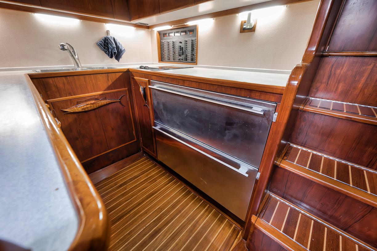 Garlington-44 Express 1996 -FL-US-Luxurious wooden interior of a 1996 Garlington 44 Express yacht kitchen.-9651424 | Thumbnail