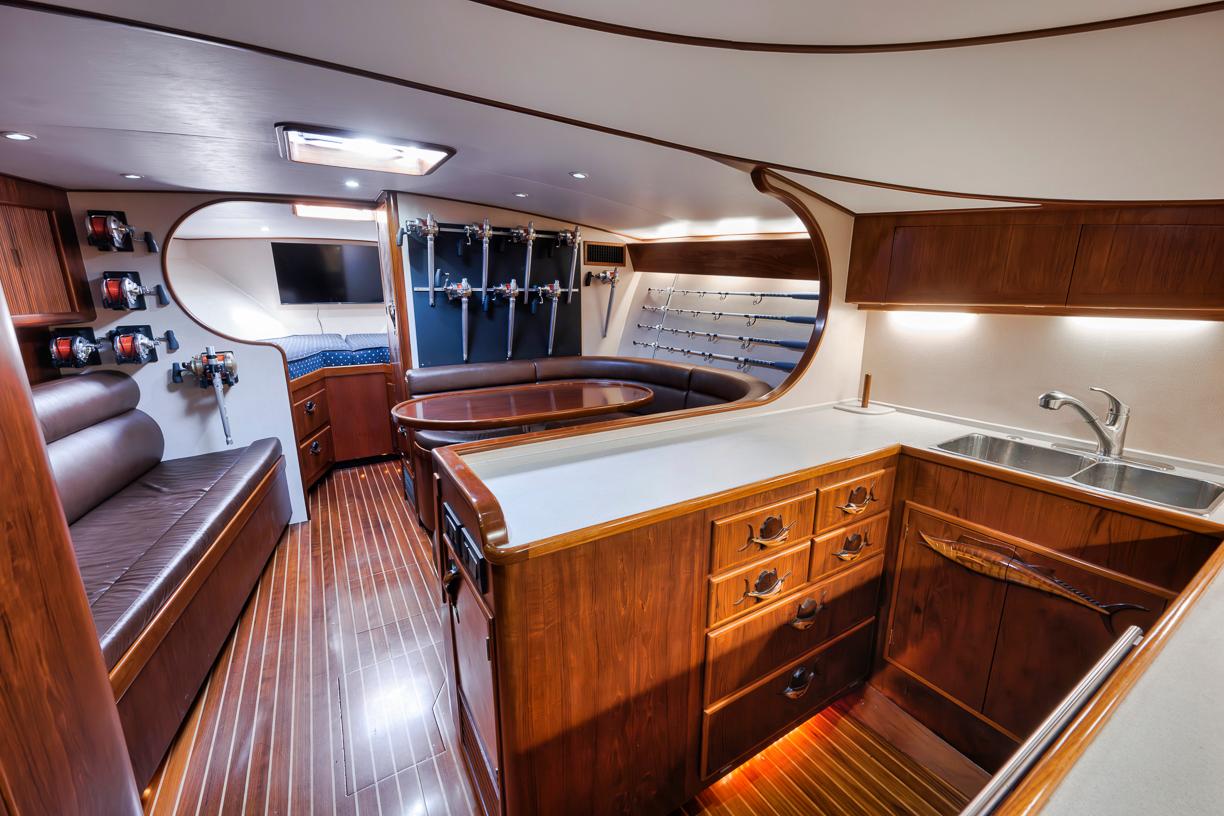 Garlington-44 Express 1996 -FL-US-Luxurious interior of a 1996 Garlington 44 Express yacht with wood finishes and modern amenities.-9651424 | Thumbnail