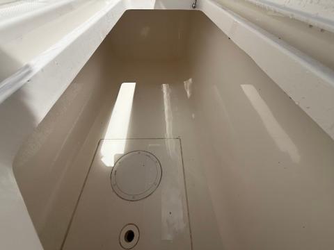 2022 Invincible 33 Catamaran storage compartment, featuring a clean, spacious interior.