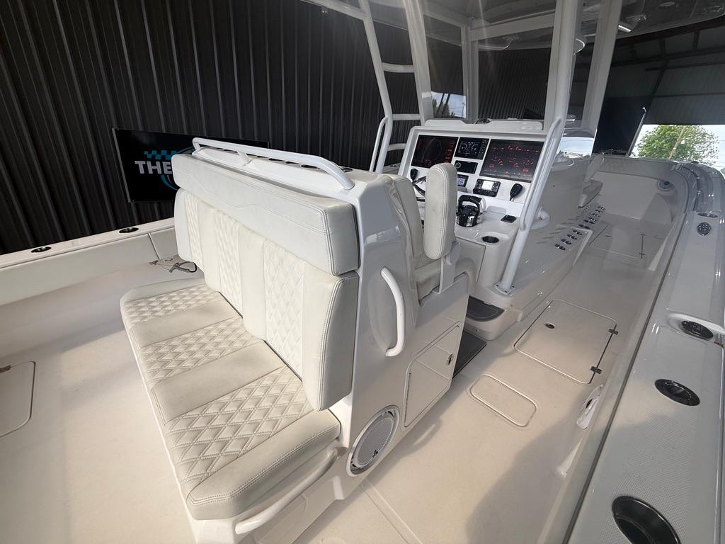 2022 Invincible 33 Catamaran interior with modern seating and advanced control panel.