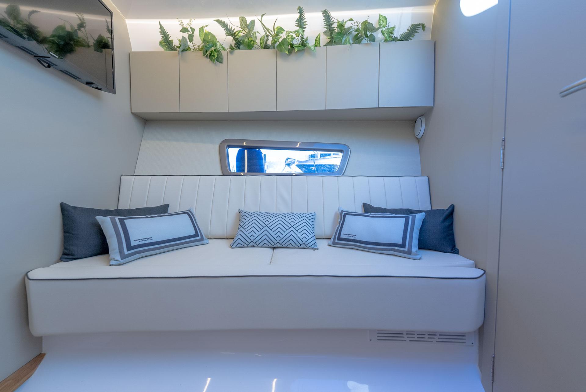Hanover-415 2024-Music FL-US-Luxurious interior of 2024 Hanover 415 yacht with modern seating and decorative plants.-9751409 | Thumbnail
