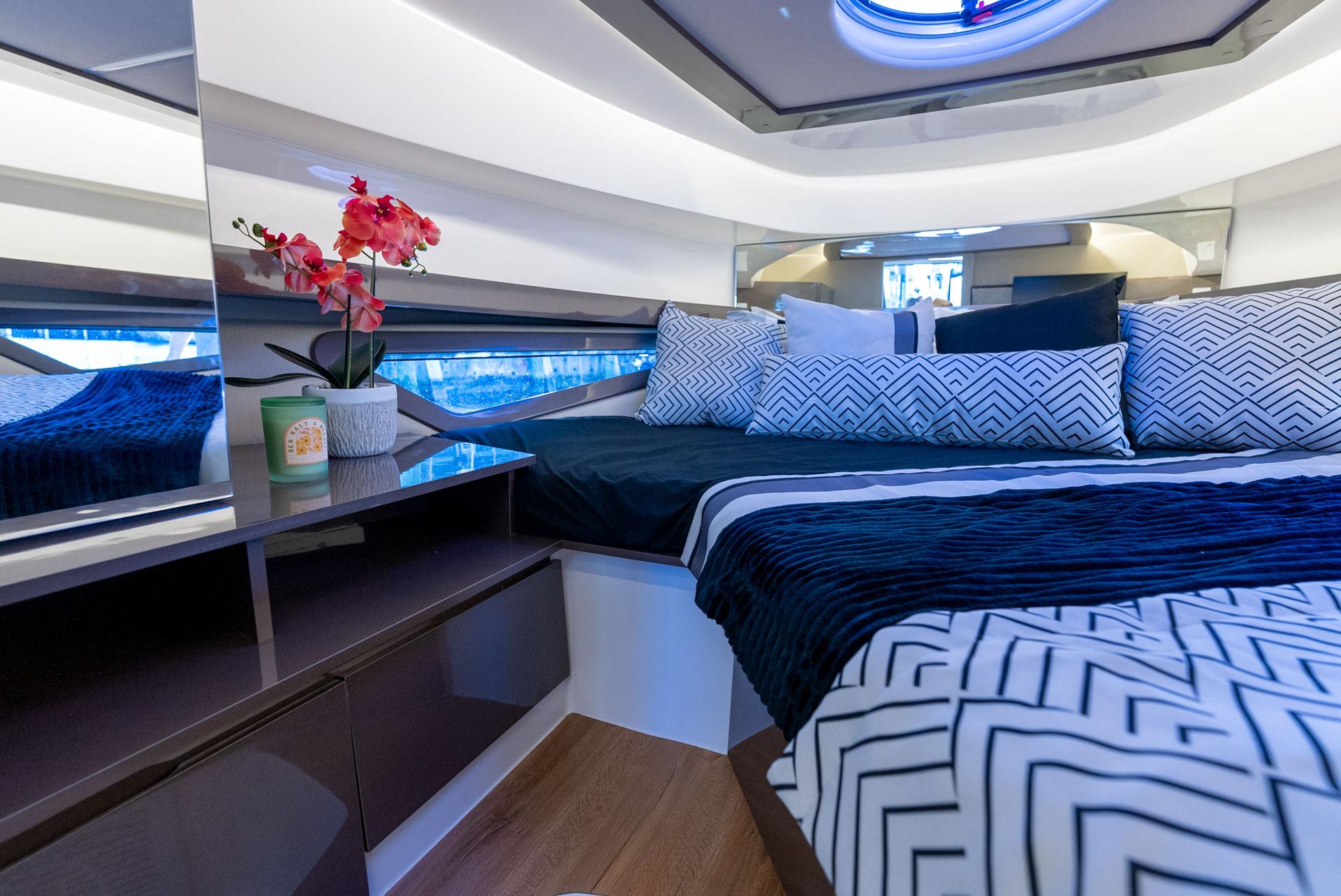 Hanover-415 2024-Music FL-US-Luxurious interior of 2024 Hanover 415 yacht with modern decor and comfortable bedding.-9751409 | Thumbnail