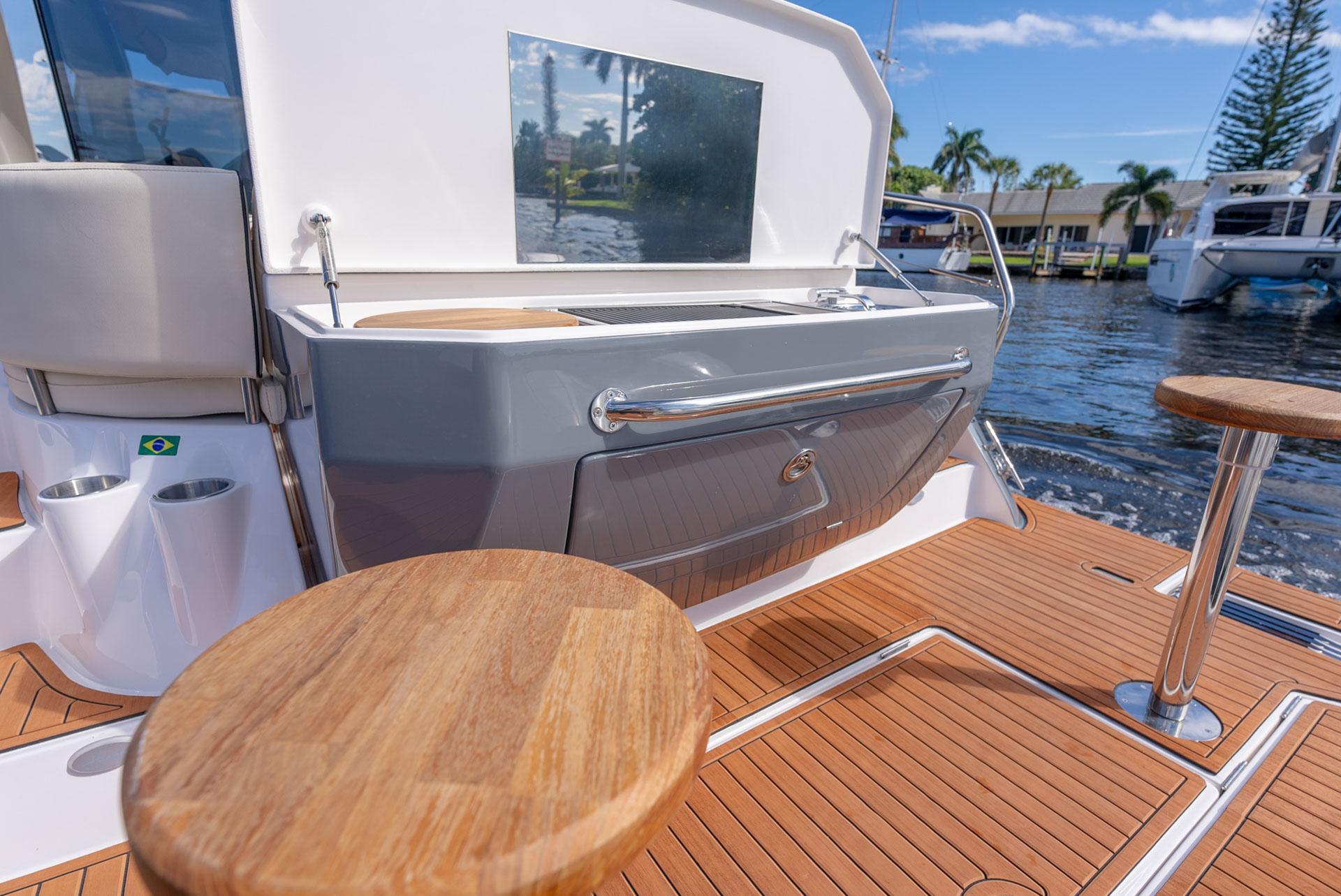 Hanover-415 2024-Music FL-US-2024 Hanover 415 yacht deck with wooden seating and sleek design.-9751409 | Thumbnail