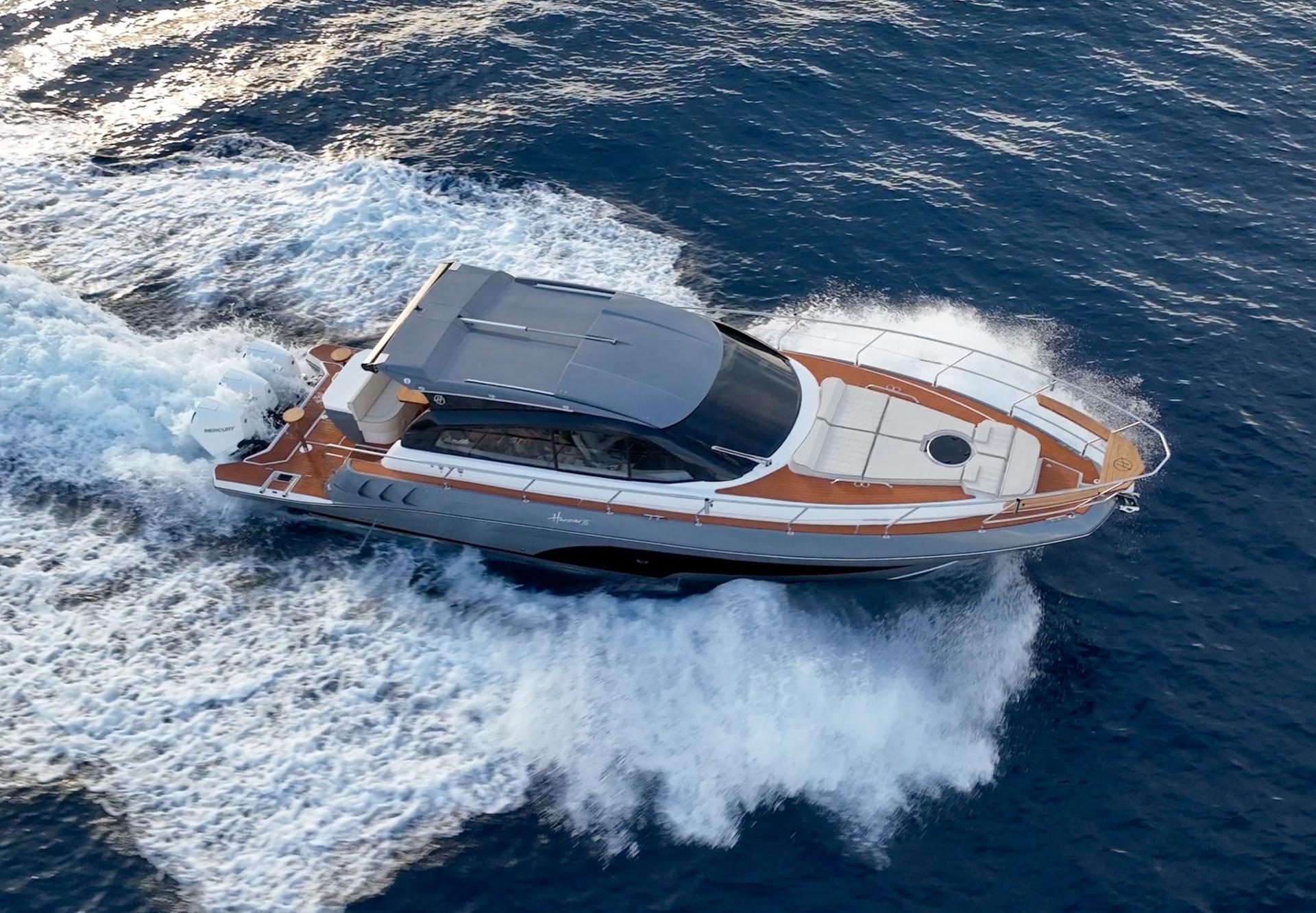 Hanover-415 2024-Music FL-US-Luxurious 2024 Hanover 415 yacht cruising swiftly on open blue waters.-9751409 | Thumbnail