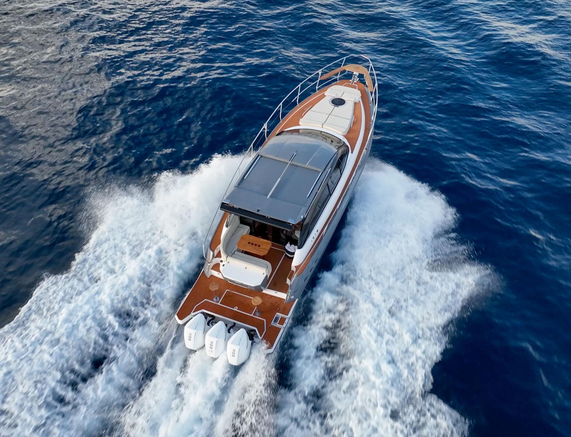 Hanover-415 2024-Music FL-US-2024 Hanover 415 boat cruising on open water, aerial view.-9751409 | Thumbnail